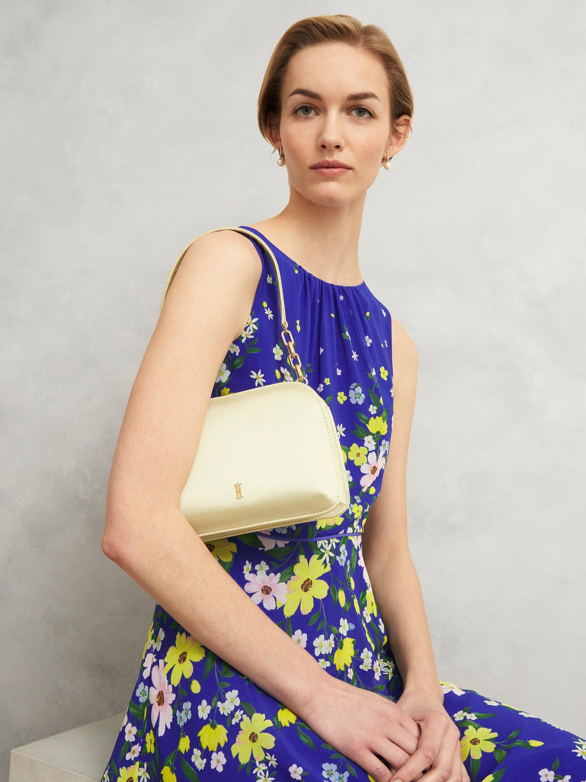 Product image 4 of 5, which shows Hobbs Milan Clutch Bag, Pale Yellow, One Size