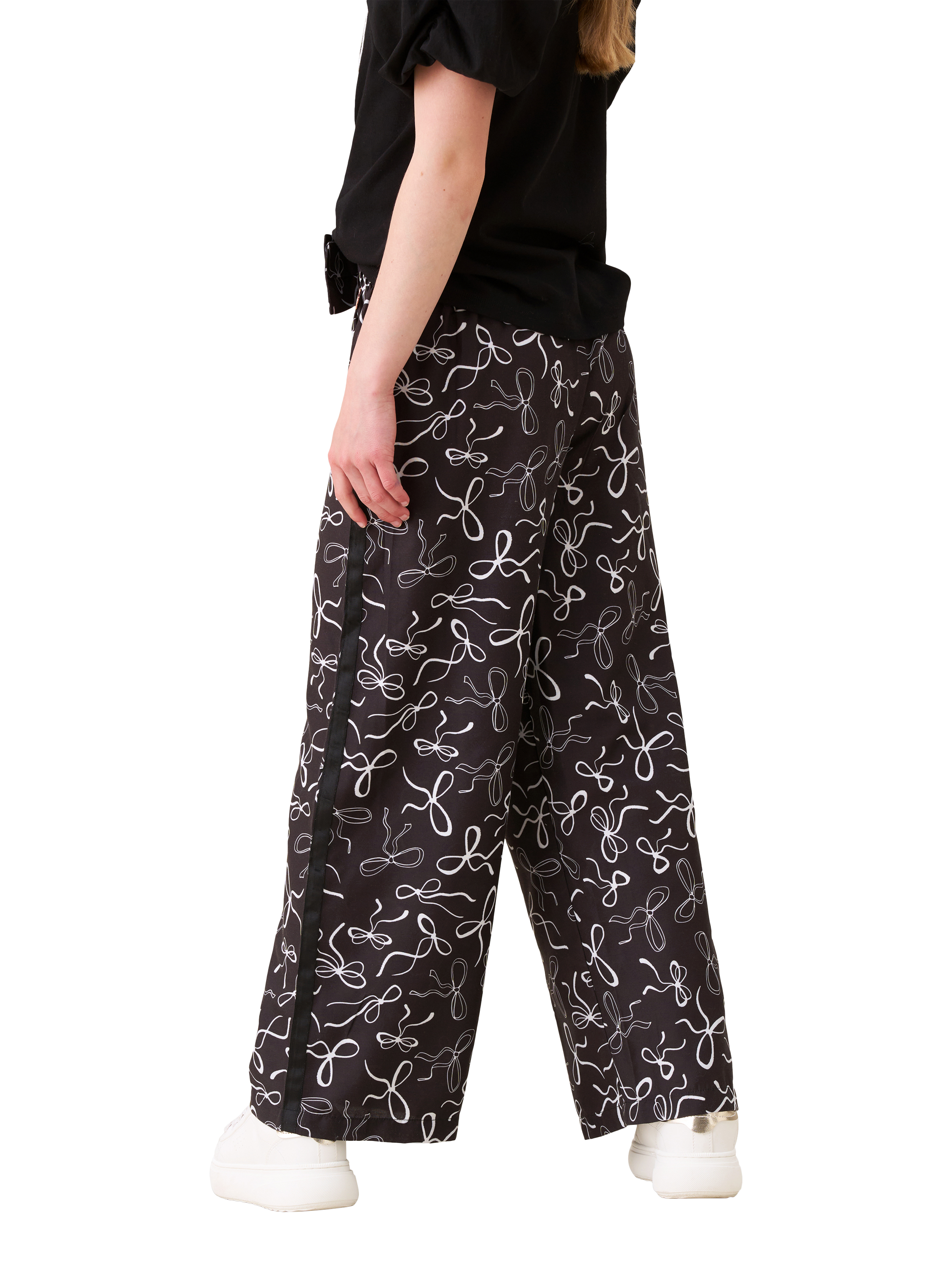 Product image 4 of 7, which shows Angel & Rocket Kids' Bow Print Wide Leg Trousers, Black, 3 years
