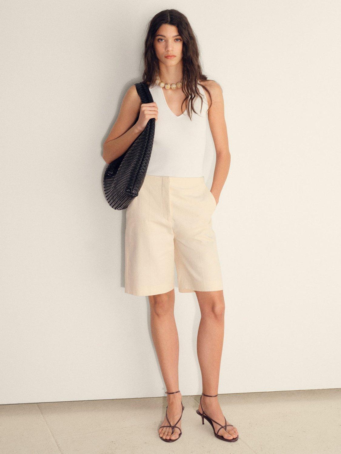 Product image 1 of 7, which shows Mango Norma Sleeveless Ribbed Halterneck V Neck Top, Light Beige, L