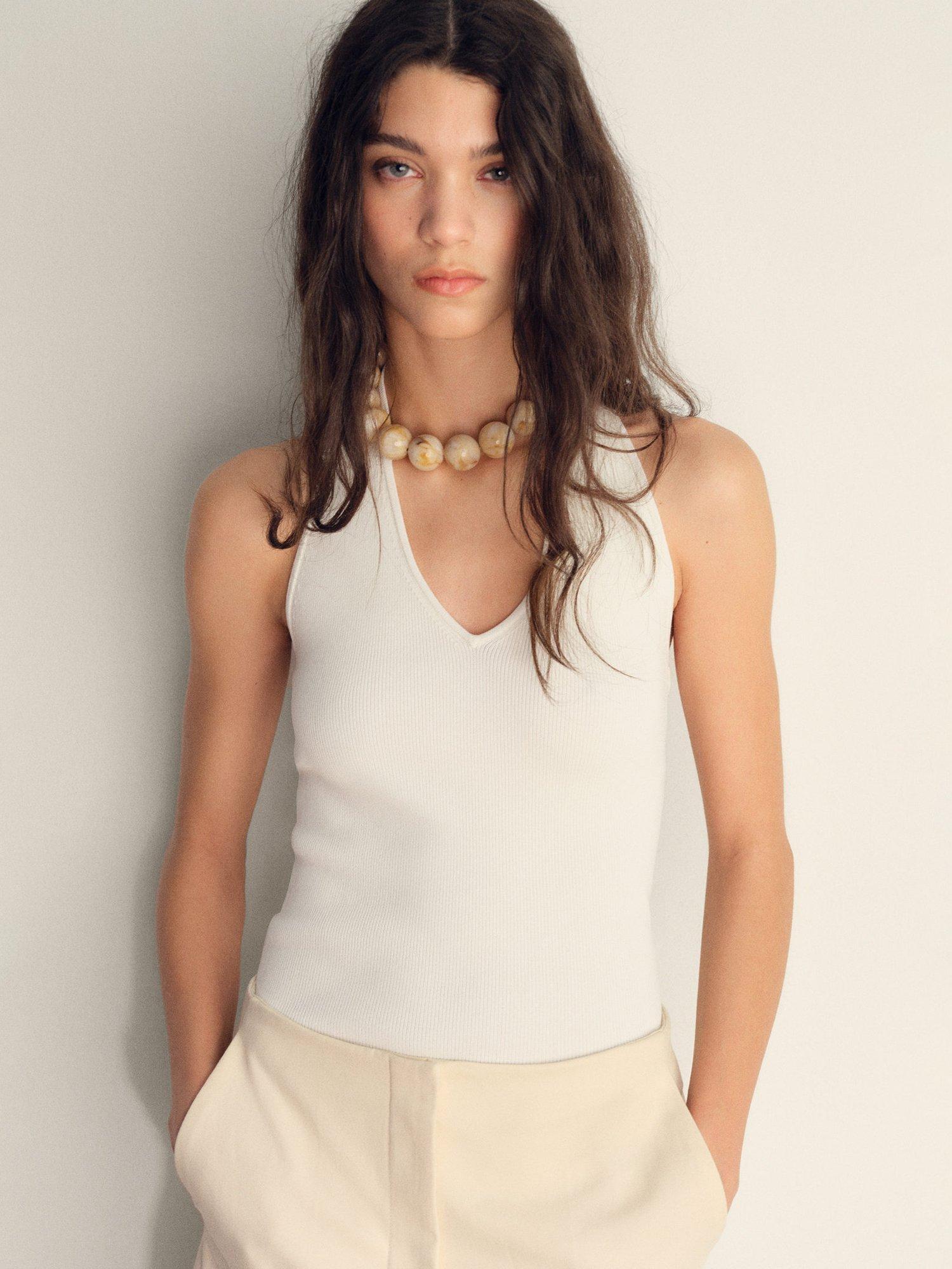 Product image 6 of 7, which shows Mango Norma Sleeveless Ribbed Halterneck V Neck Top, Light Beige, L