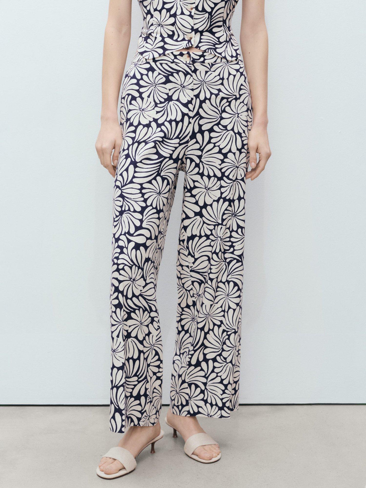 Product image 1 of 9, which shows Mango Coco Flowers Linen Rich Trousers, Light Beige/Multi, XS