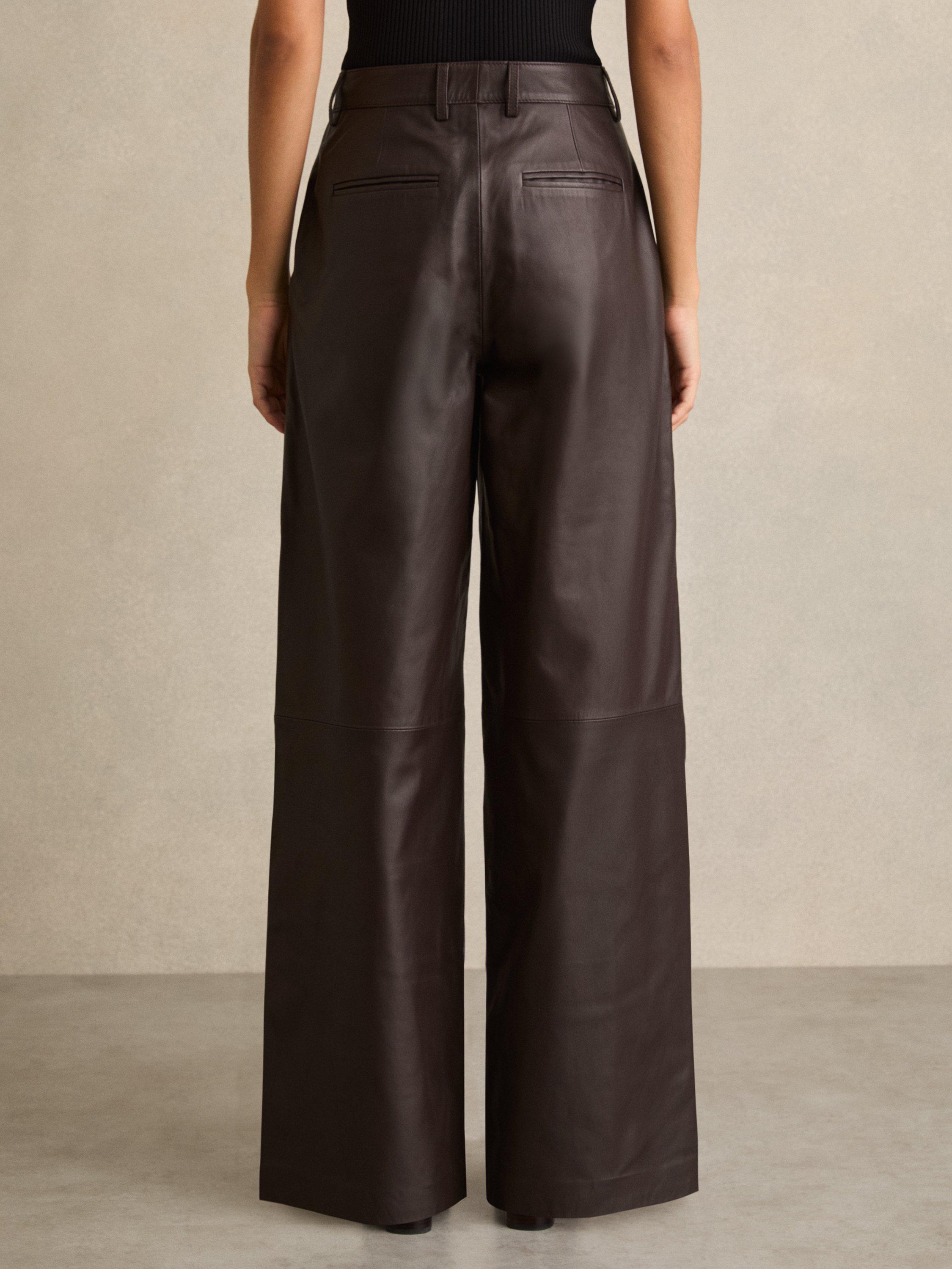 Product image 2 of 5, which shows Reiss Mercey Petite Wide Leg Leather Trousers, Chocolate, 6Pt