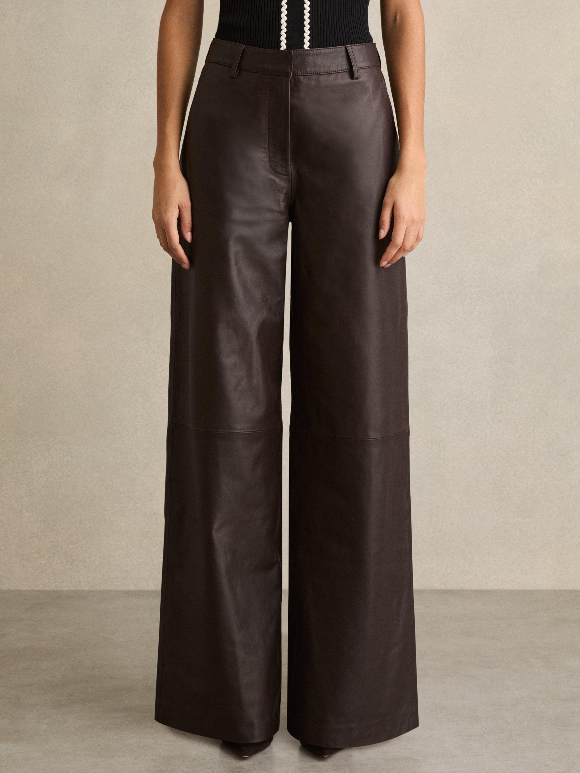 Product image 4 of 5, which shows Reiss Mercey Petite Wide Leg Leather Trousers, Chocolate, 6Pt