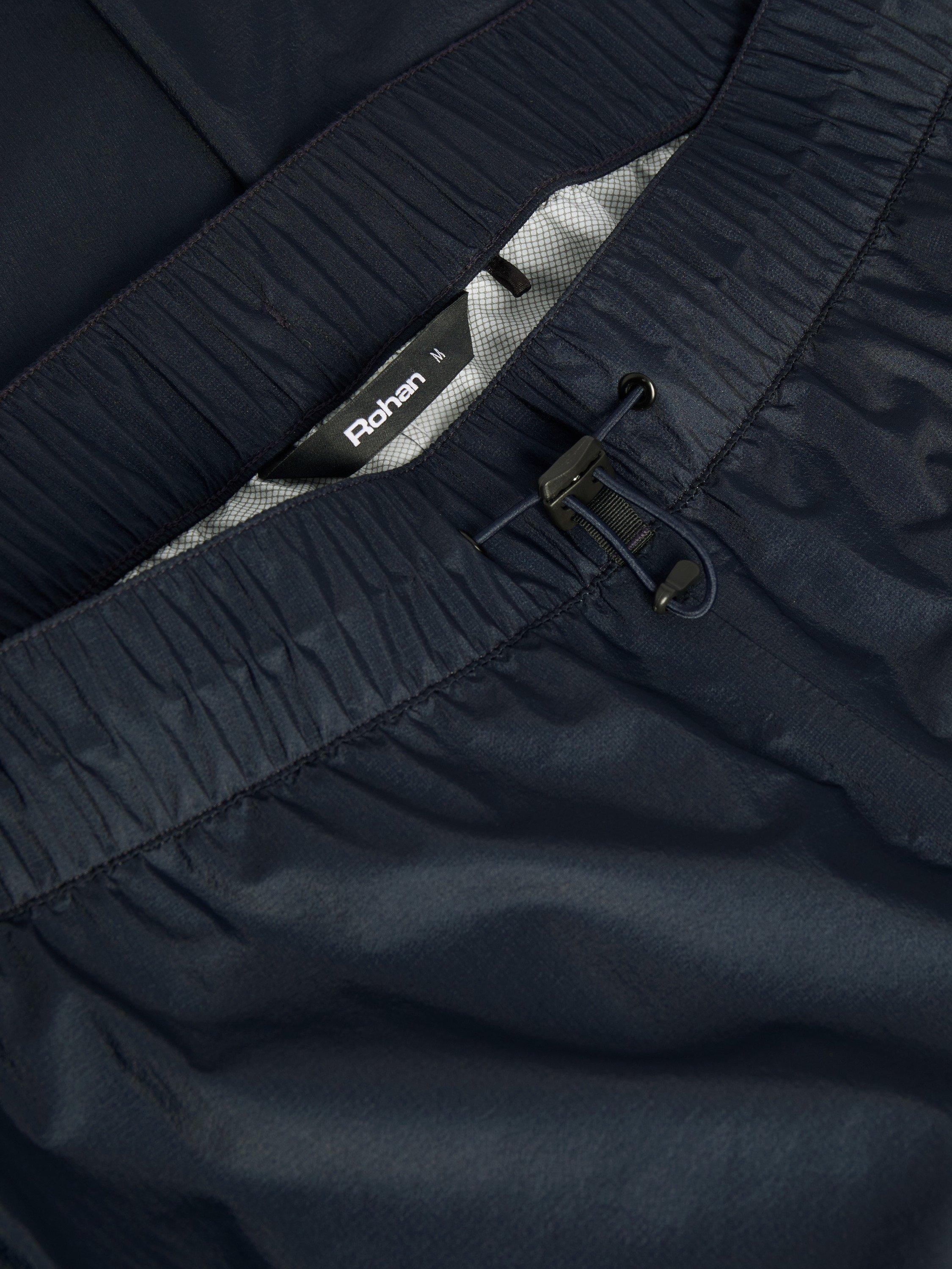 Product image 8 of 8, which shows Rohan Heath Waterproof Overtrousers, True Navy, XS Sht