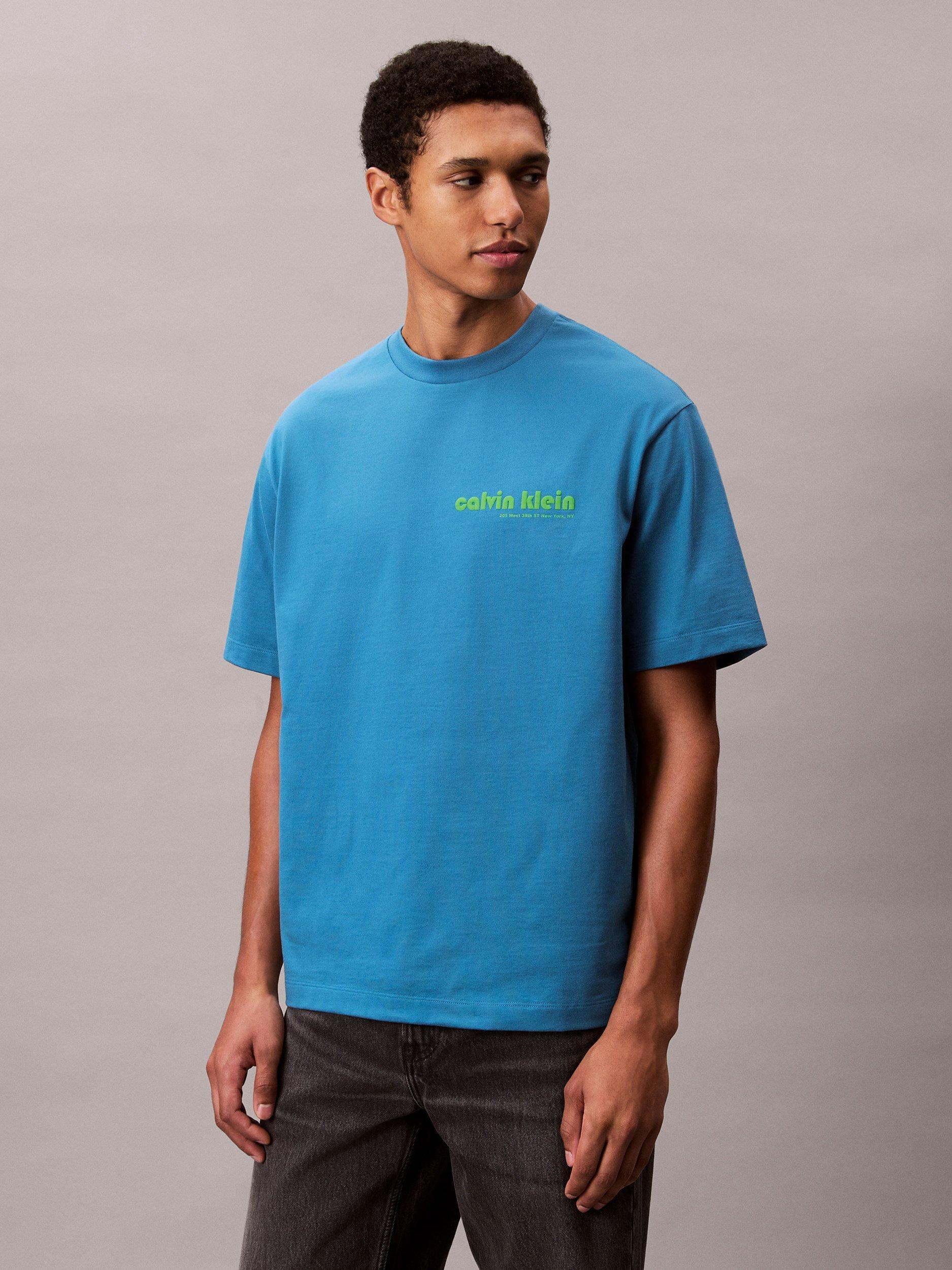 Product image 4 of 5, which shows Calvin Klein Cotton Regular Fit Short Sleeve Logo T-Shirt, Bluesteel, XS