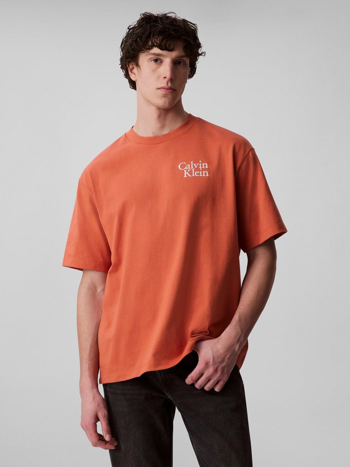 Product image 1 of 5, which shows Calvin Klein Cotton Regular Fit Short Sleeve Logo T-Shirt, Mecca Orange, L