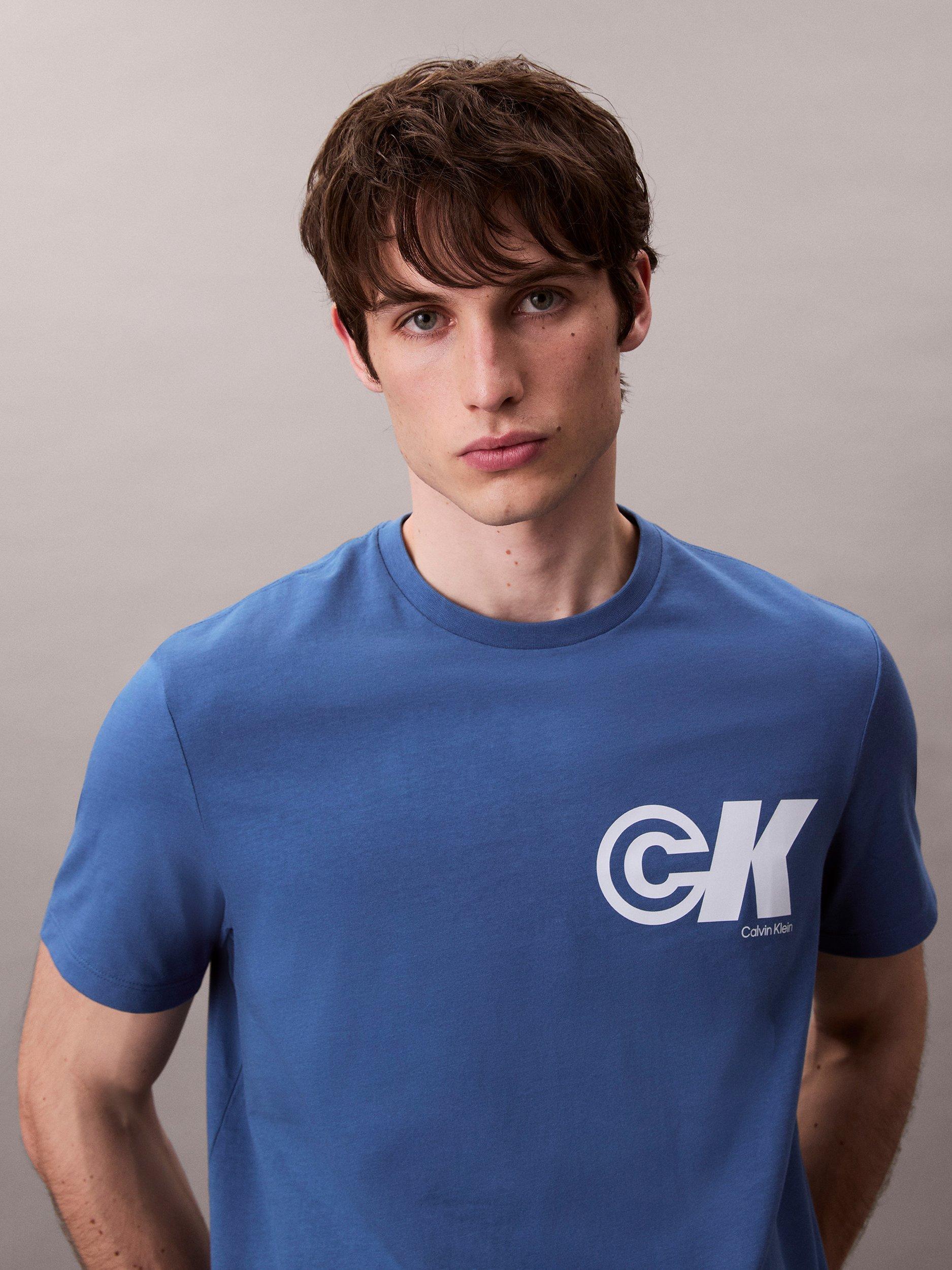 Product image 4 of 4, which shows Calvin Klein Cotton Regular Fit Short Sleeve CK Logo T-Shirt, Royal Lagoon, L