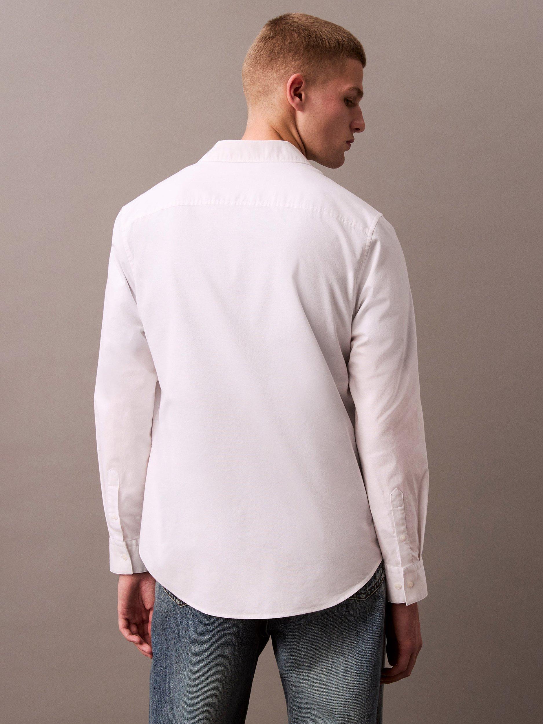 Product image 2 of 5, which shows Calvin Klein Cotton Blend Classic Oxford Long Sleeve Shirt, Brilliant White, L