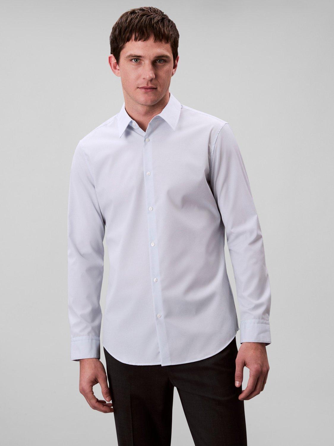 Product image 1 of 5, which shows Calvin Klein Cotton Blend Stretch Long Sleeve Dress Shirt, Niagara Mist, L