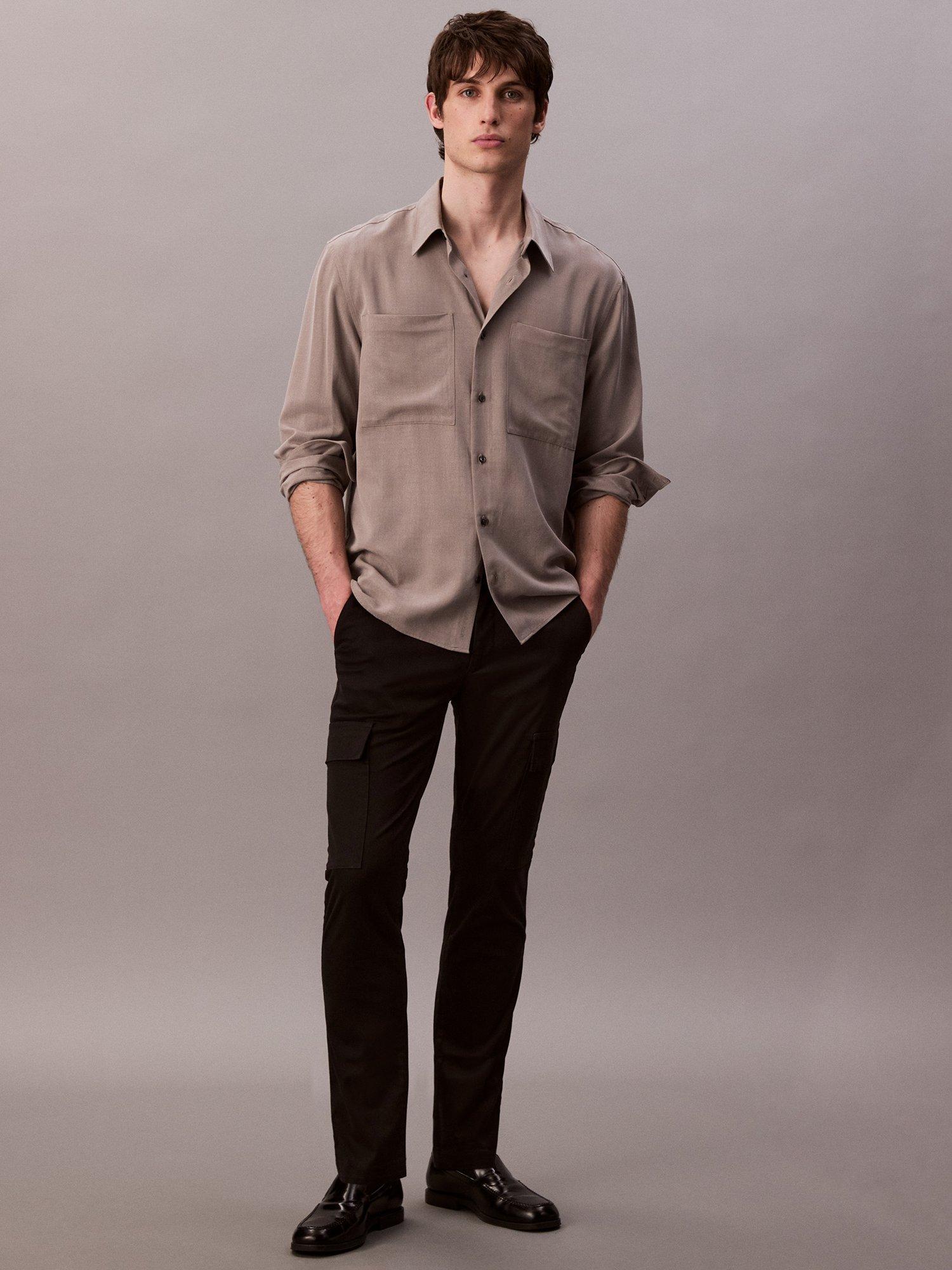 Product image 1 of 5, which shows Calvin Klein Cotton Blend Slim Stretch Cargo Trousers, Black, 33R