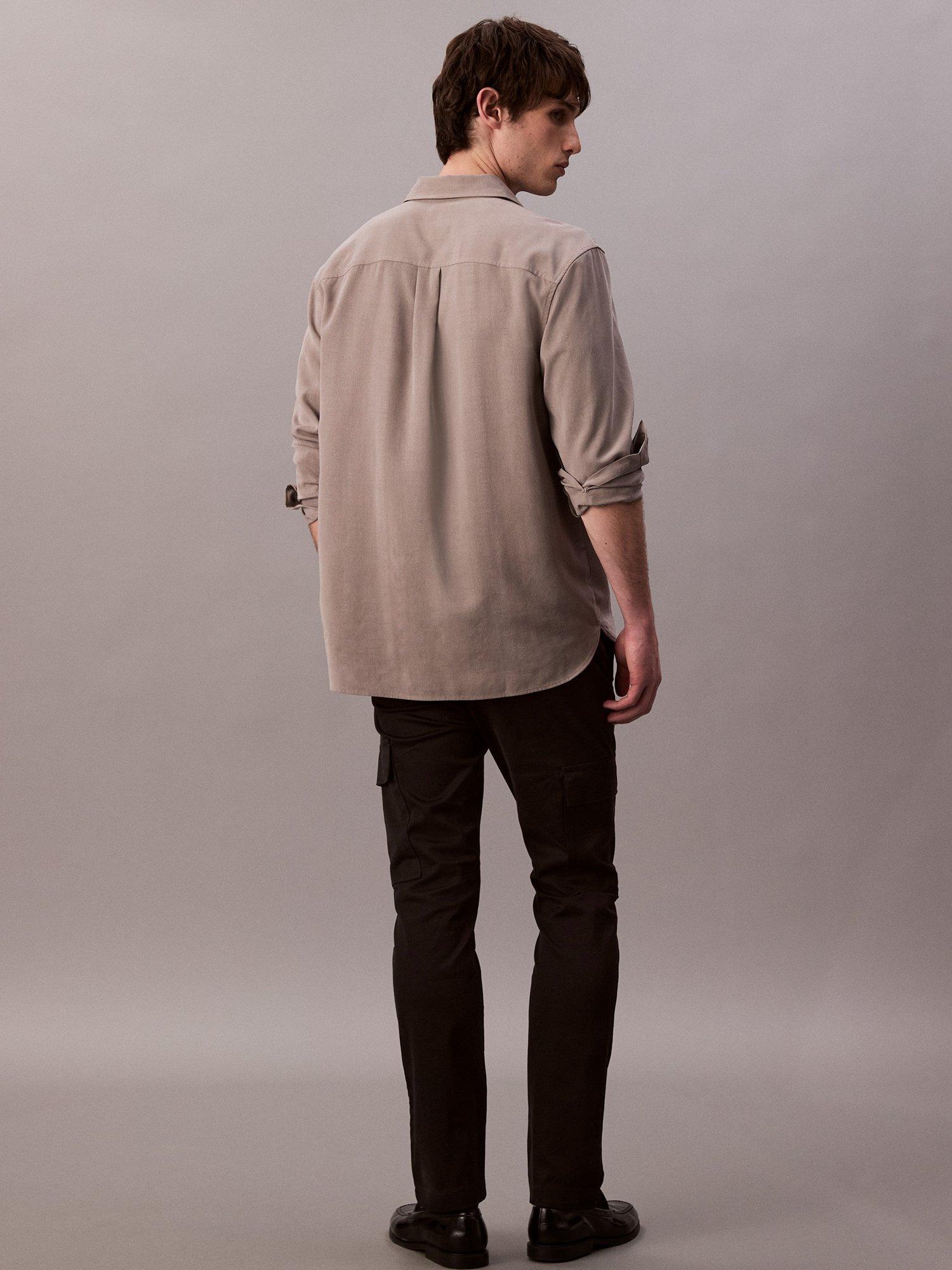 Product image 2 of 5, which shows Calvin Klein Cotton Blend Slim Stretch Cargo Trousers, Black, 33R