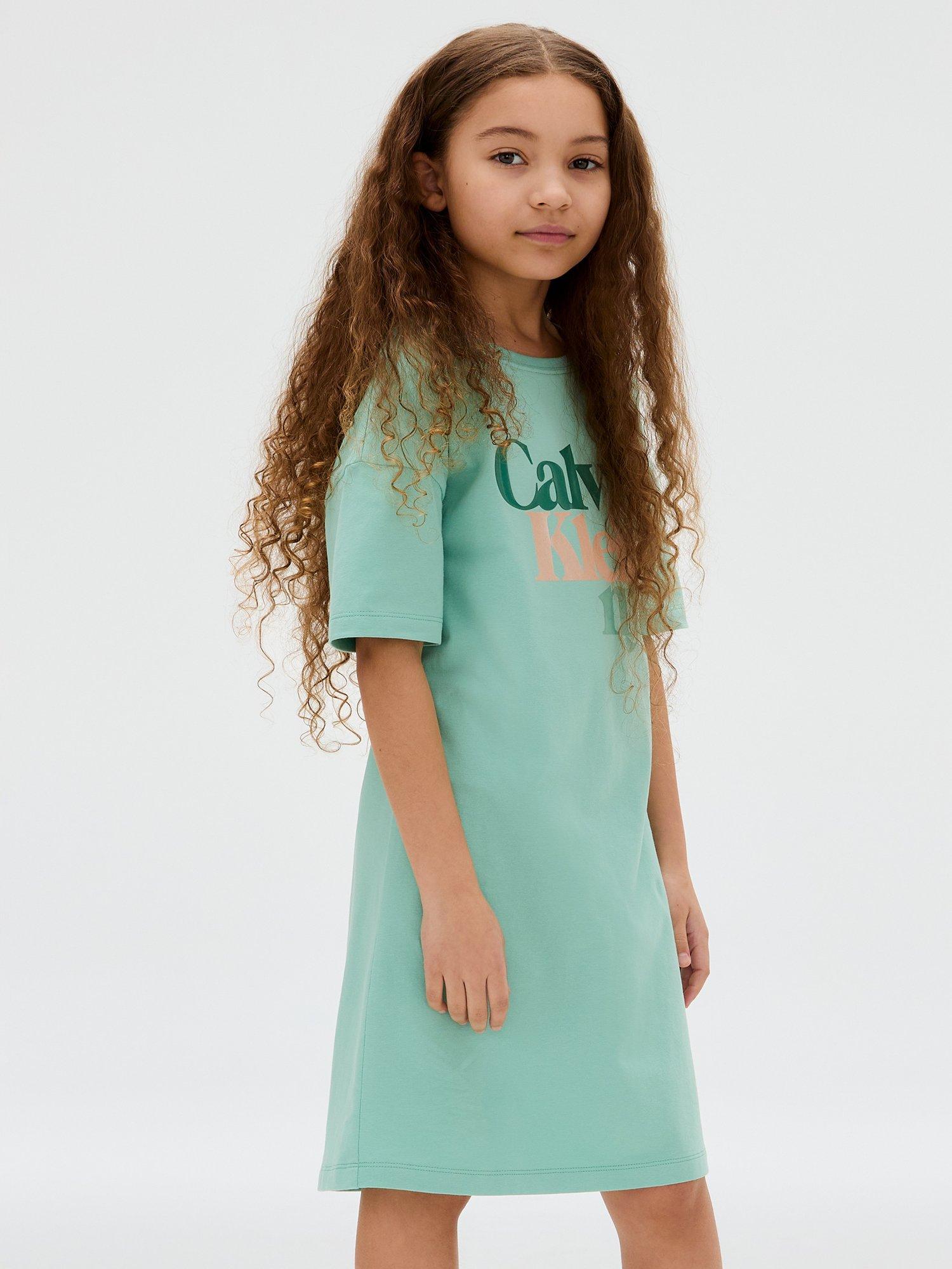 Product image 1 of 5, which shows Calvin Klein Kids' Cotton Short Sleeved T-shirt Dress, Tickled Green, 10 years