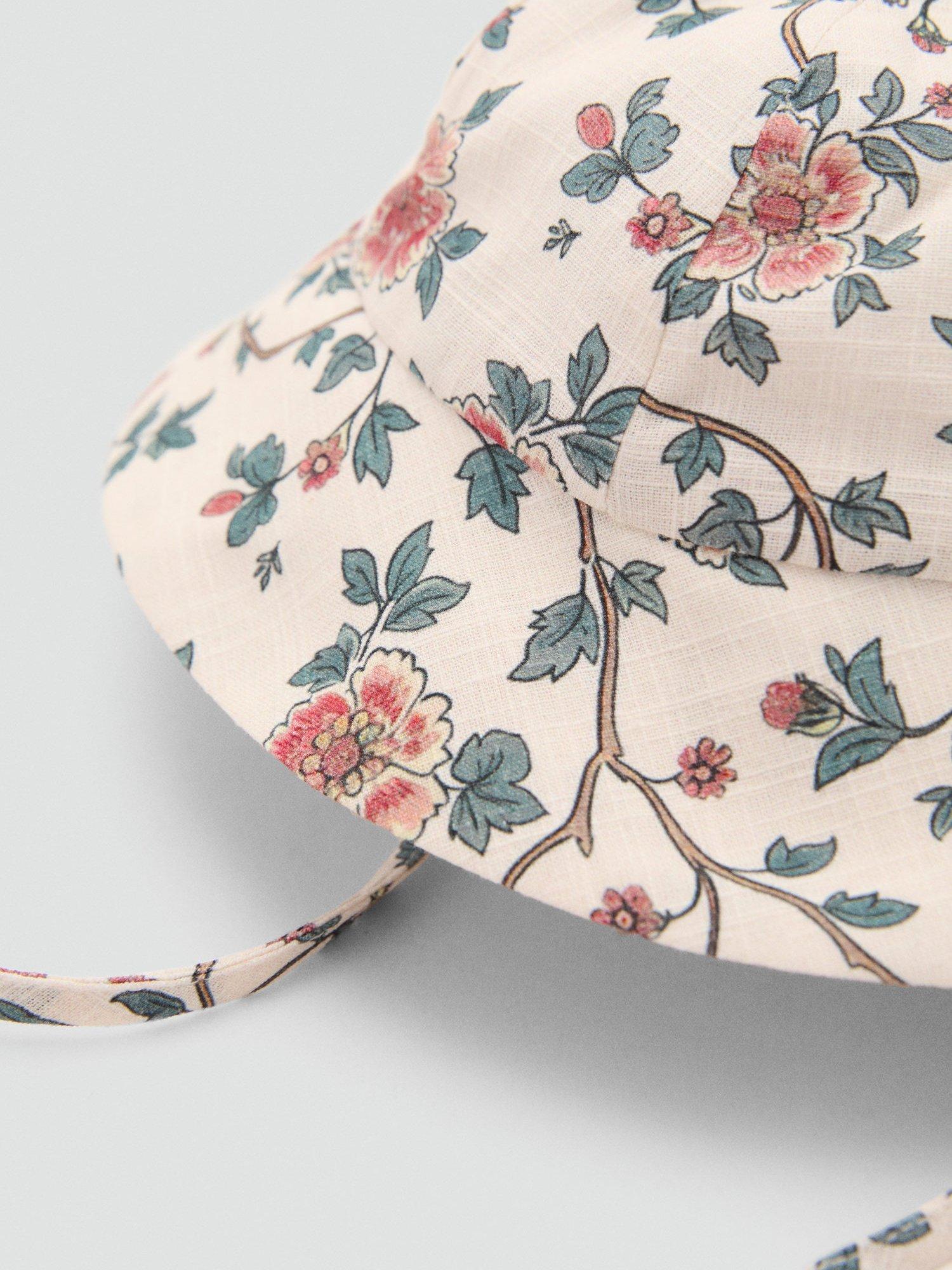 Product image 2 of 3, which shows Mango Baby Pimen Cotton Floral Bucket Hat, Light Beige, 2-6 months