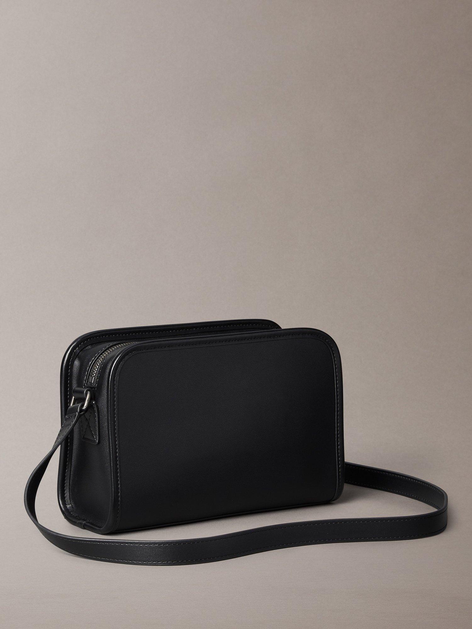 Product image 3 of 4, which shows Calvin Klein Faux Leather Crossbody Camera Bag, Black, One Size