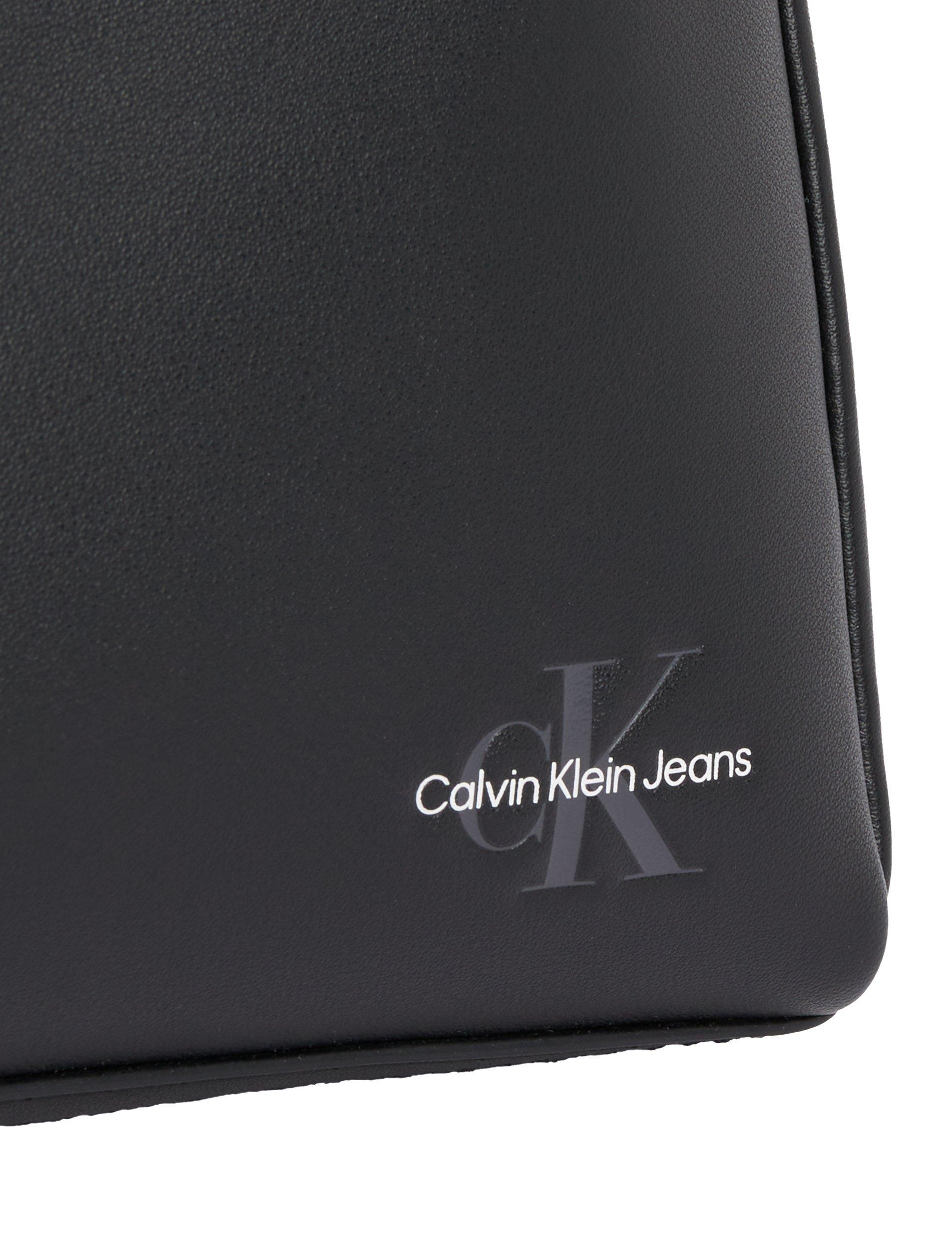 Product image 5 of 5, which shows Calvin Klein Faux Leather Reporter Bag, Black, One Size