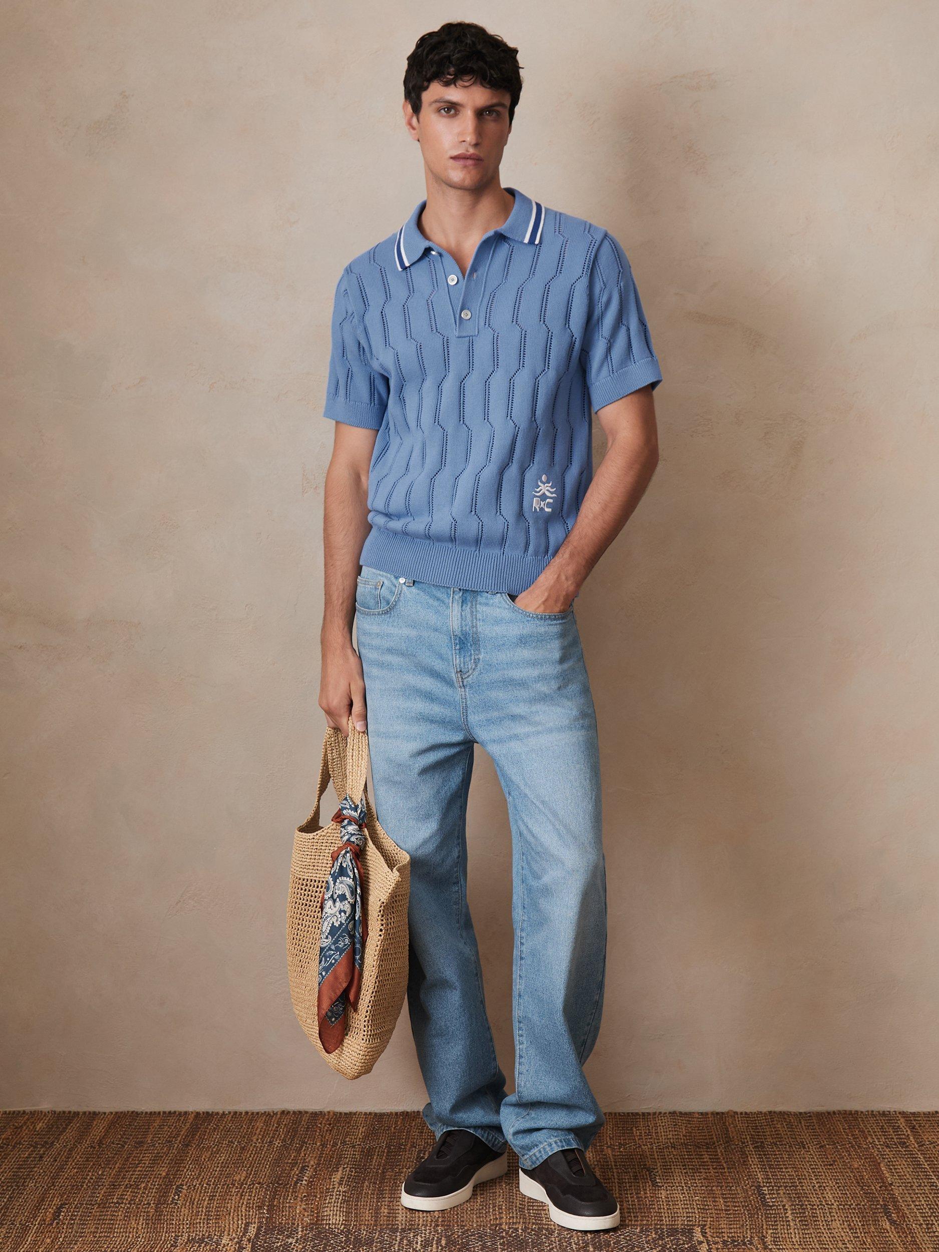 Product image 4 of 5, which shows Reiss x CHÉ Oasis Pointelle Knit Polo Shirt, Blue/Multi, L