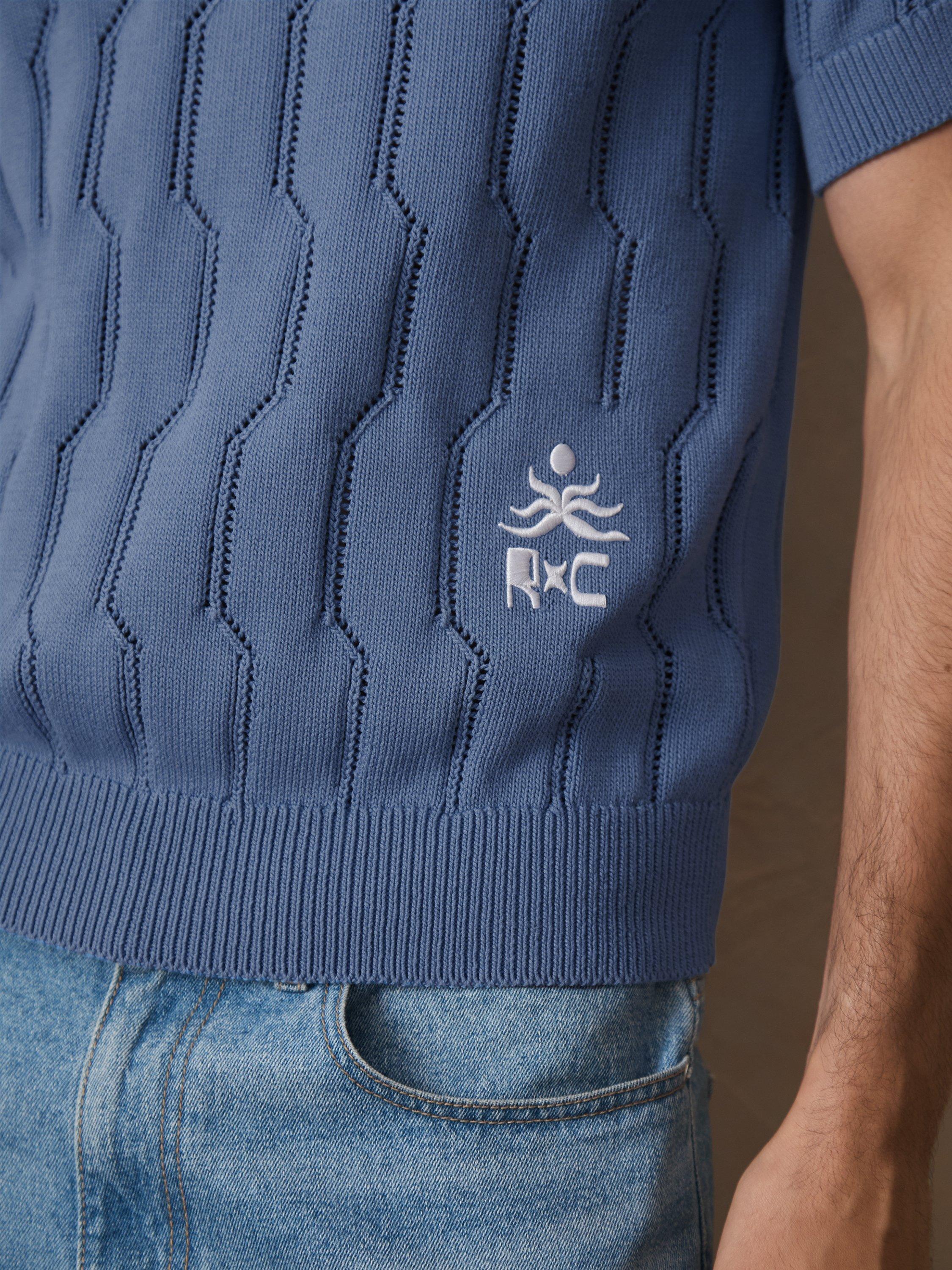 Product image 5 of 5, which shows Reiss x CHÉ Oasis Pointelle Knit Polo Shirt, Blue/Multi, L