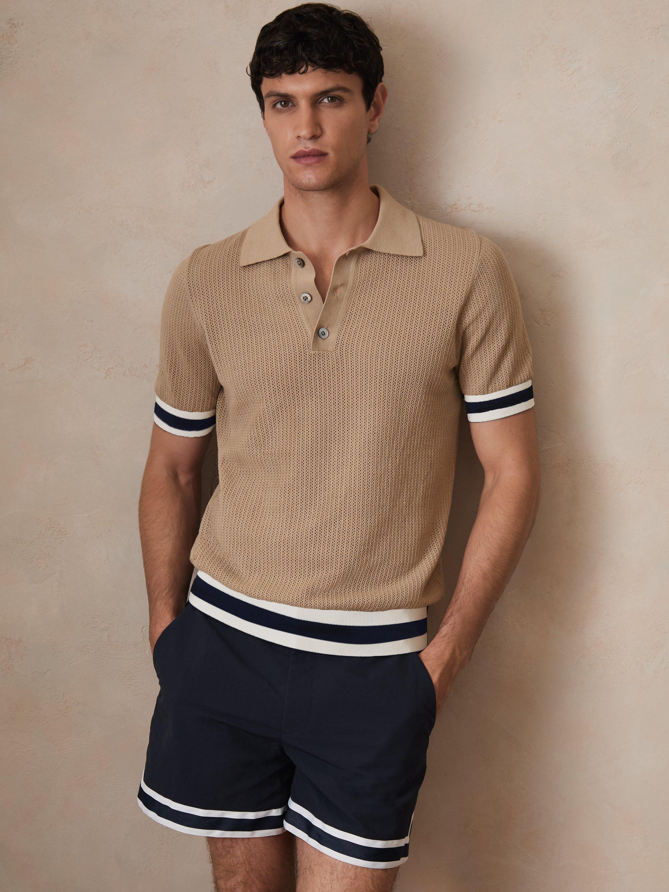 Product image 1 of 5, which shows Reiss x CHÉ Quinn Cotton Knit Short Sleeved Polo Shirt, Brown/Multi, XS