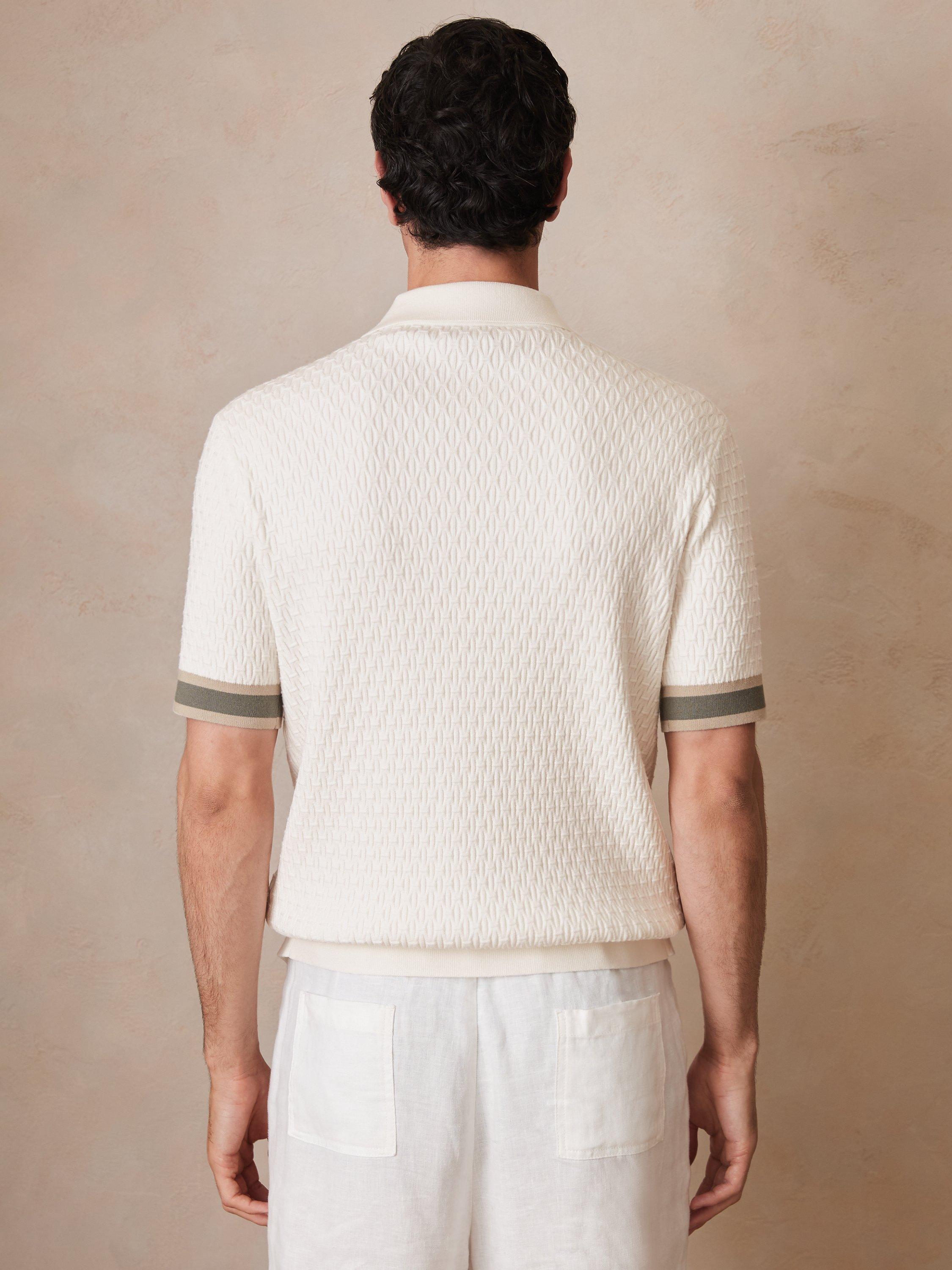Product image 2 of 5, which shows Reiss x CHÉ Knitted Short Sleeved Polo Shirt, White/Multi, M