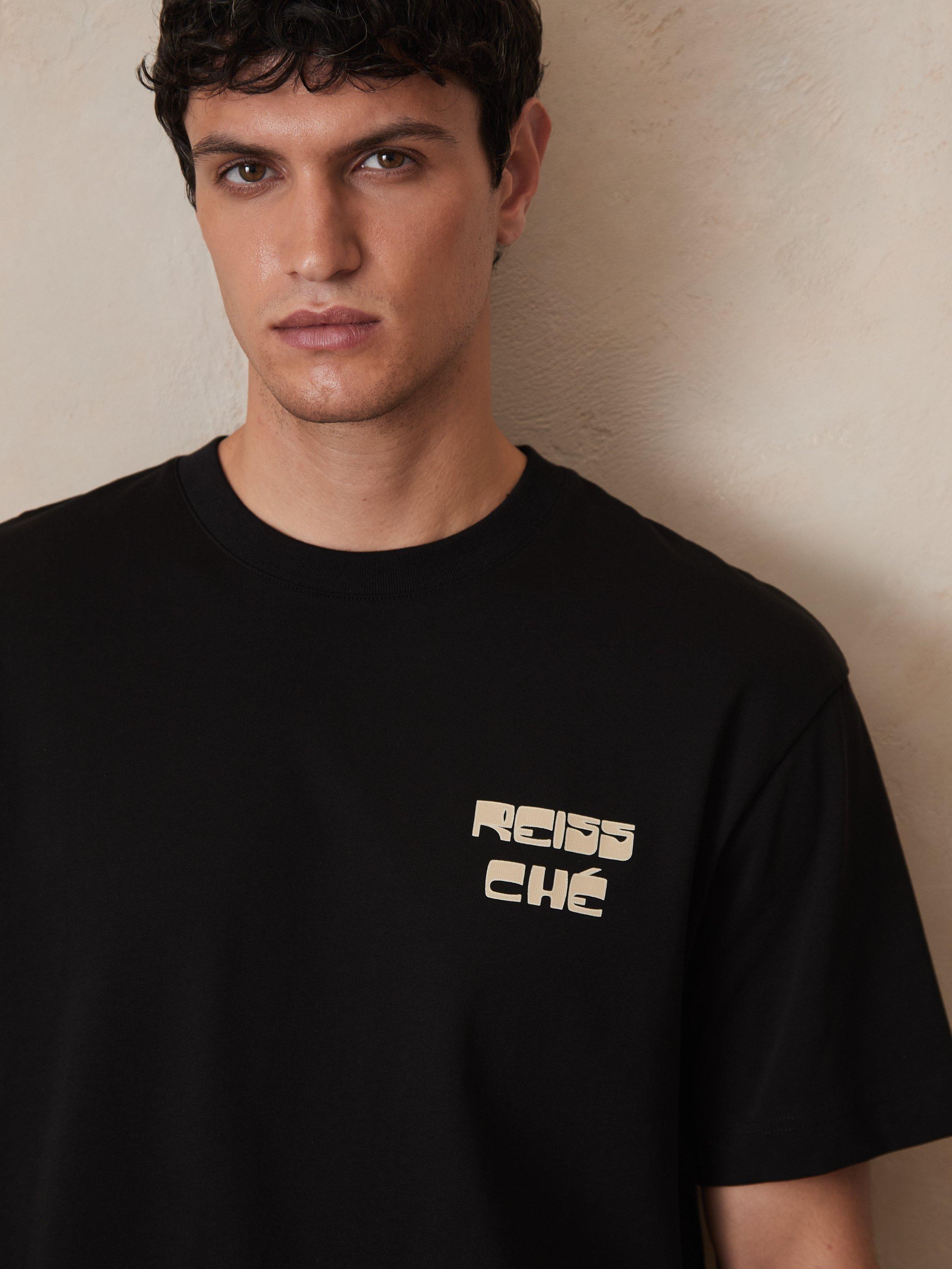 Product image 2 of 5, which shows Reiss x CHE Roda Cotton Regular Fit Short Sleeve Logo T-Shirt, Black, XS