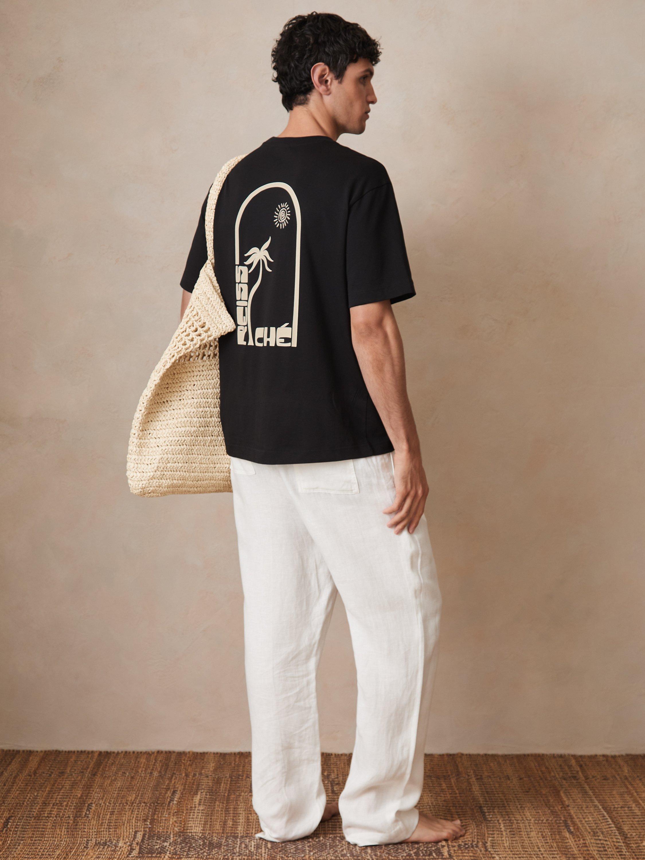 Product image 3 of 5, which shows Reiss x CHE Roda Cotton Regular Fit Short Sleeve Logo T-Shirt, Black, XS