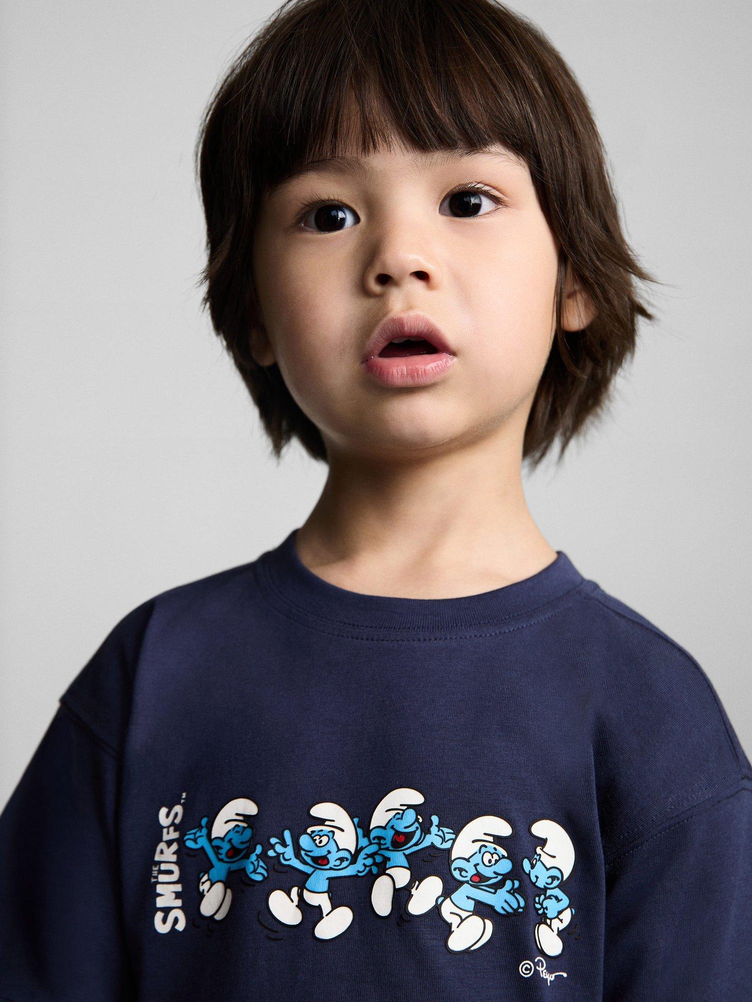 Product image 6 of 7, which shows Mango Kids' The Smurfs Cotton T-Shirt, Navy, 18-24 months