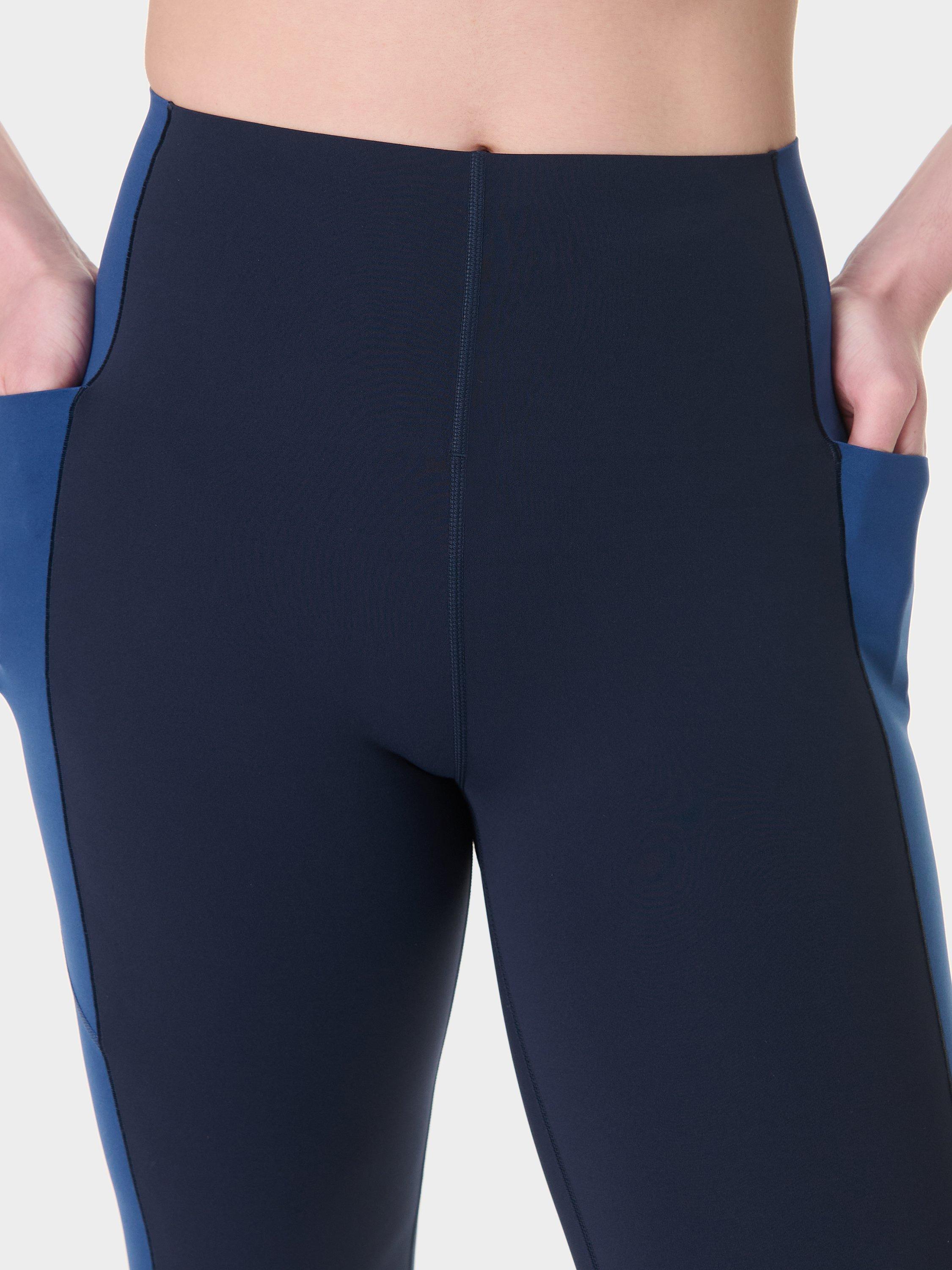 Product image 6 of 9, which shows Sweaty Betty Power UltraSculpt High Waisted 7/8 Gym Leggings, Navy Fluxblue Tidal, XXS
