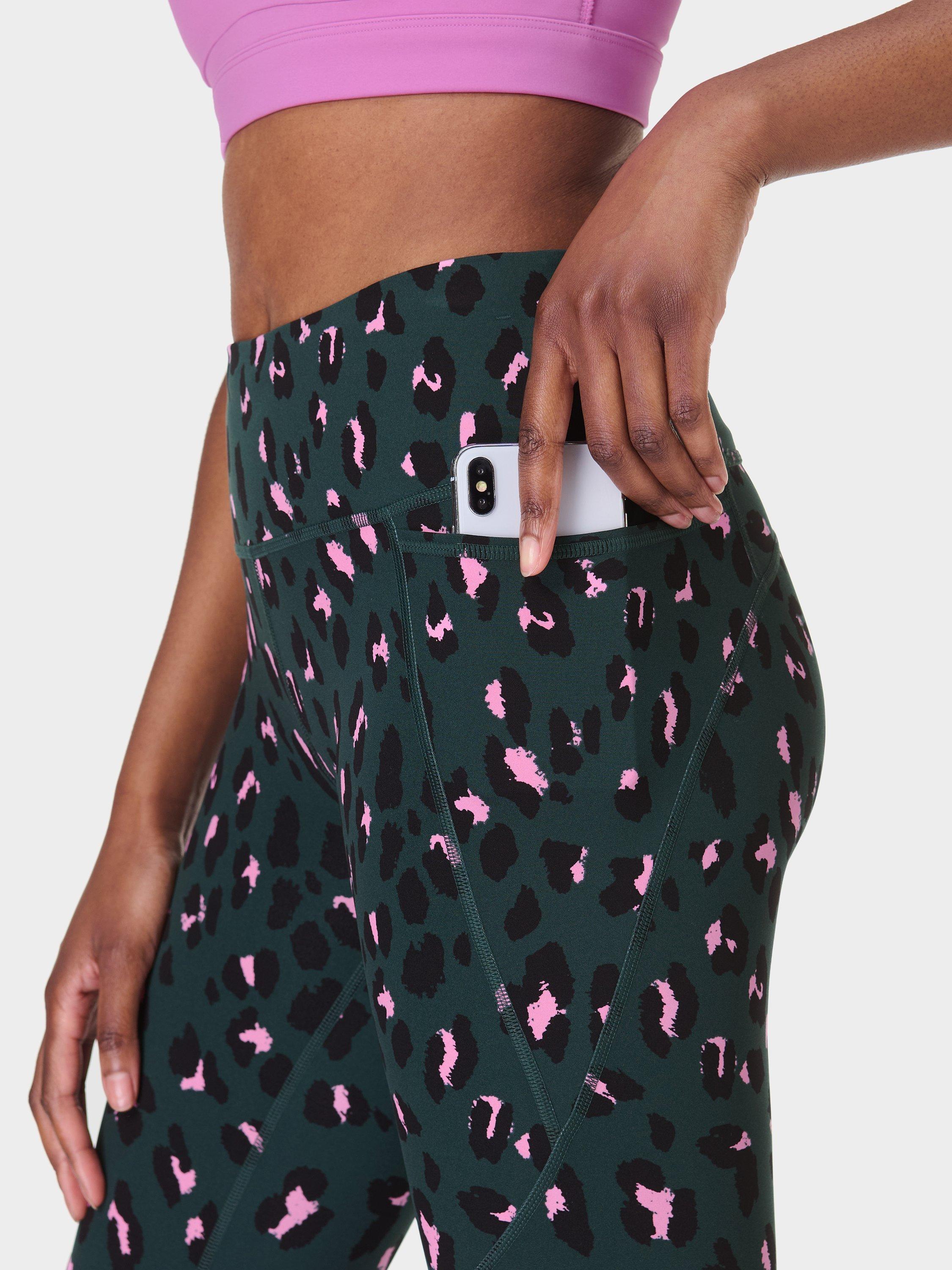 Product image 7 of 9, which shows Sweaty Betty Power 7/8 Workout Leggings, Green Cheetah Print, XXS