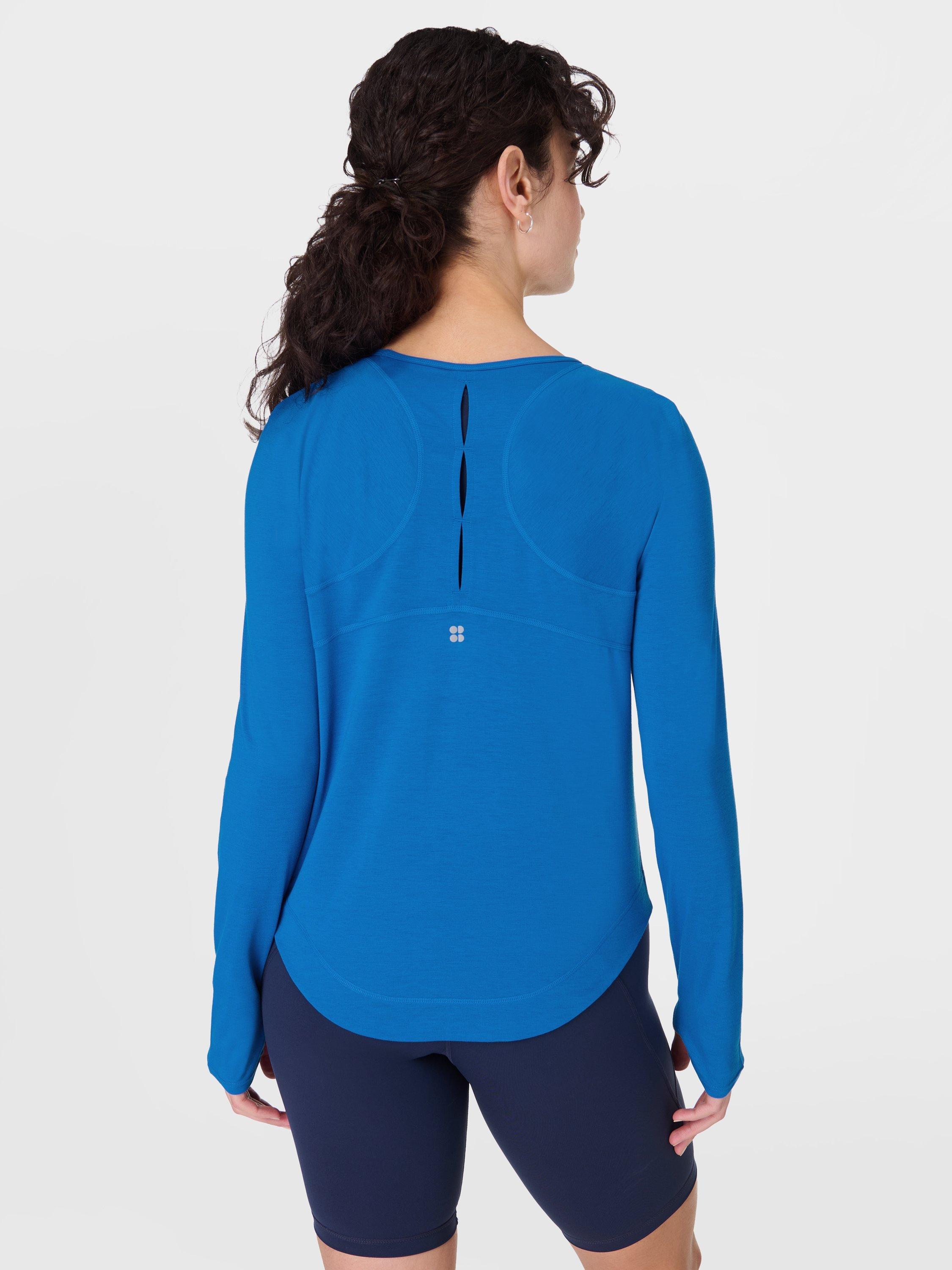 Product image 4 of 7, which shows Sweaty Betty Breezy Long Sleeve Top, Oxford Blue, XXS