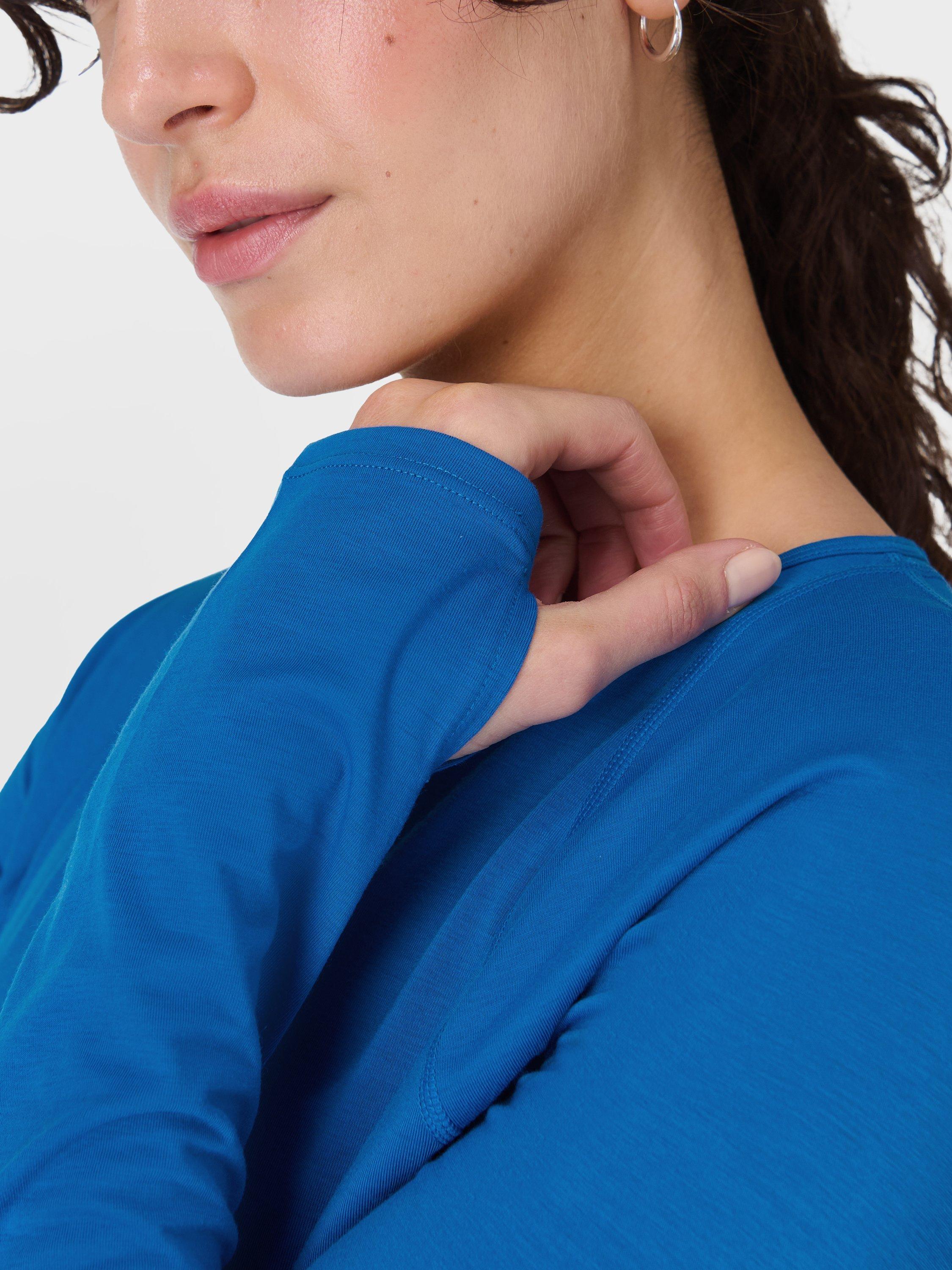 Product image 5 of 7, which shows Sweaty Betty Breezy Long Sleeve Top, Oxford Blue, XXS