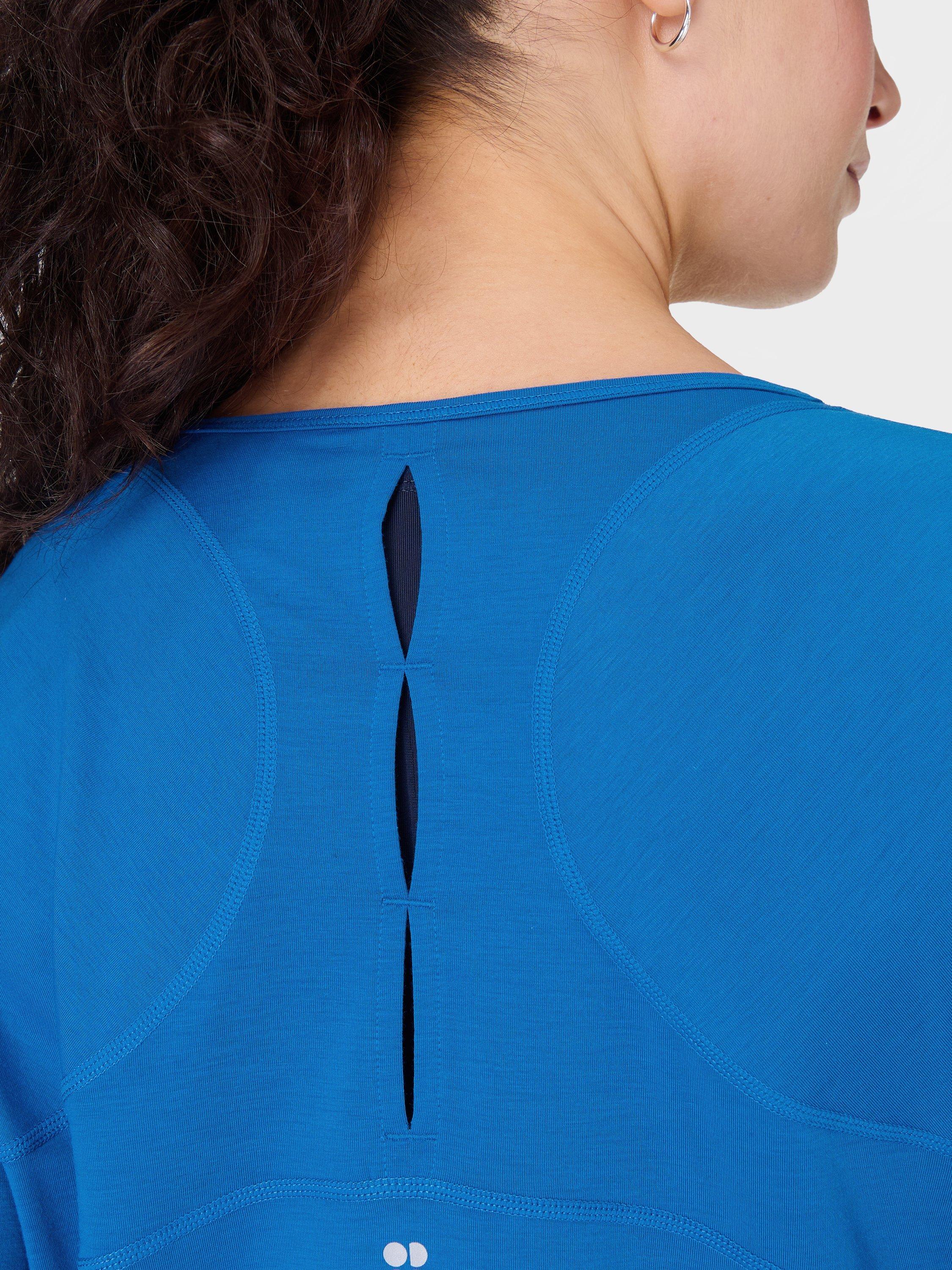 Product image 6 of 7, which shows Sweaty Betty Breezy Long Sleeve Top, Oxford Blue, XXS
