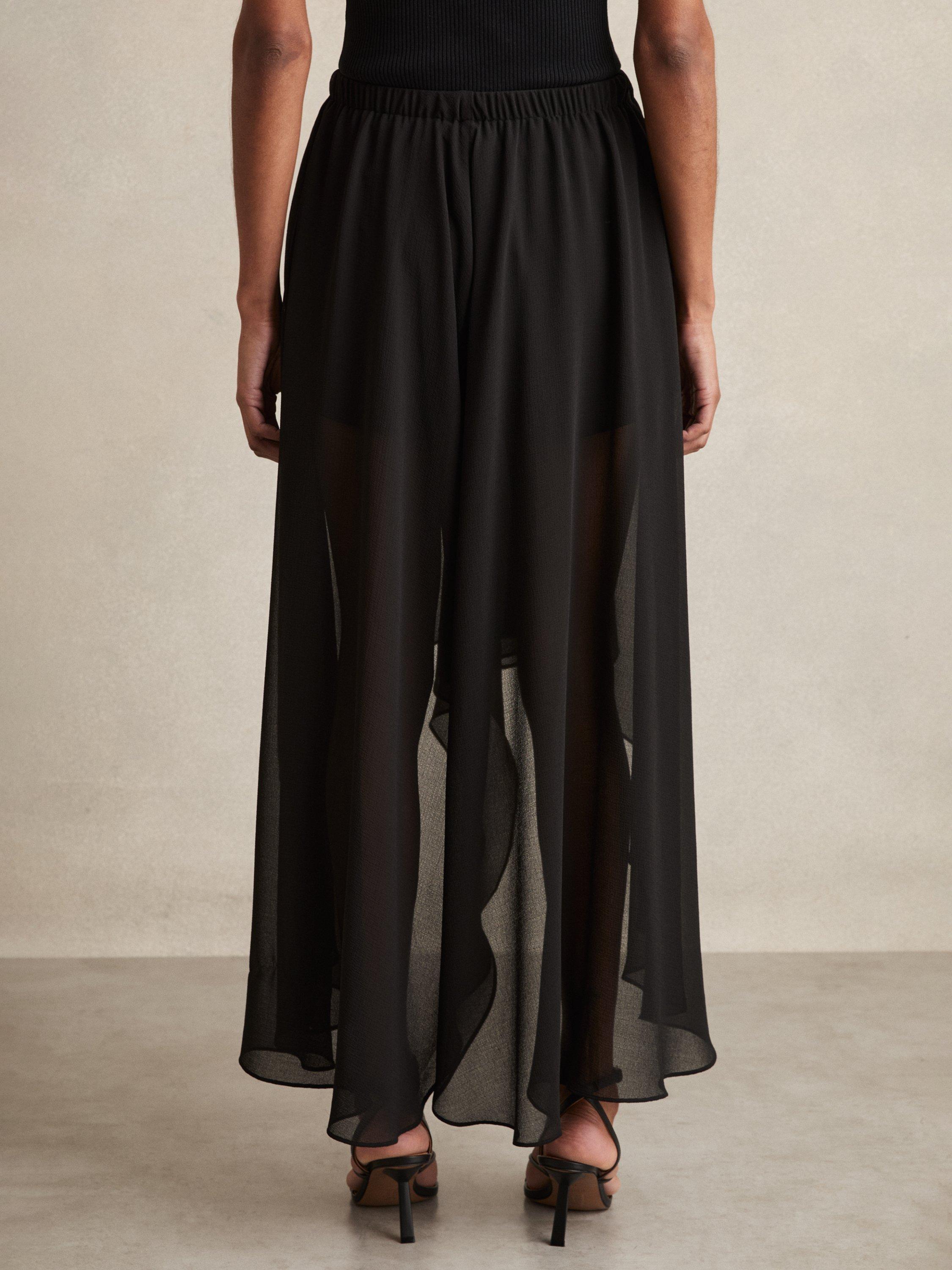Product image 2 of 5, which shows Reiss Lucie Mini Shorts and Sheer Overlay, Black, 6