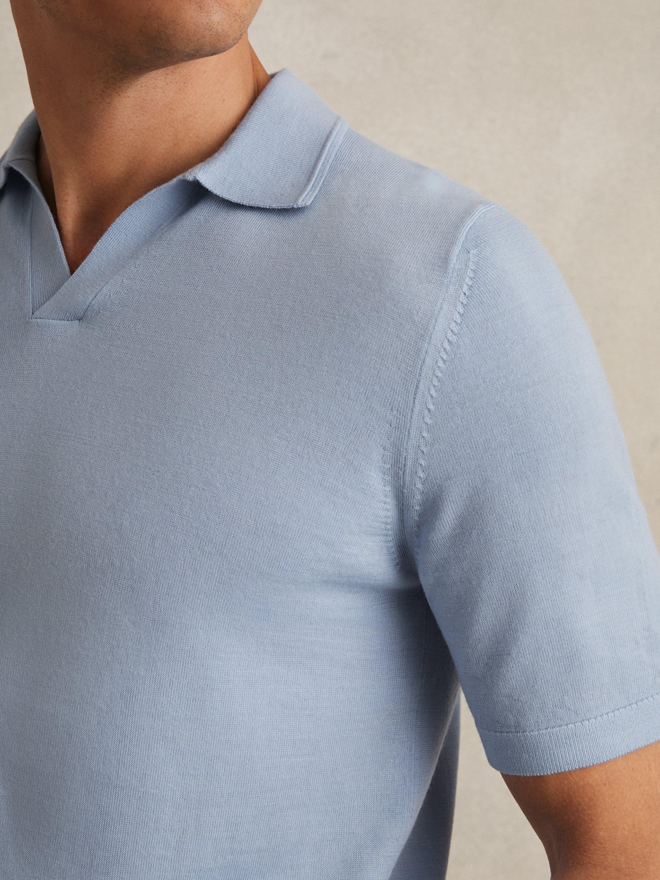 Product image 5 of 5, which shows Reiss Duchie Short Sleeve Wool Polo Shirt, Soft Blue, M