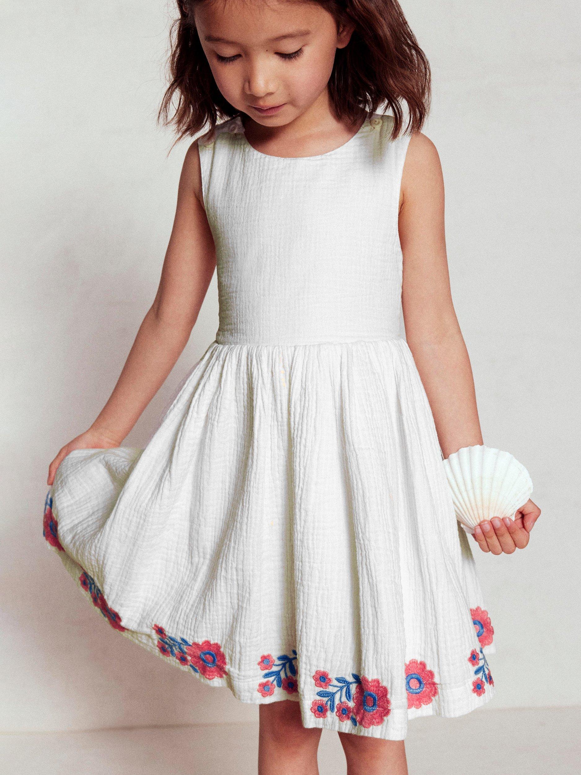 Product image 1 of 6, which shows Mini Boden Kids' Harper Cotton Sleeveless Floral Dress, White Embroidered, 2-3 years