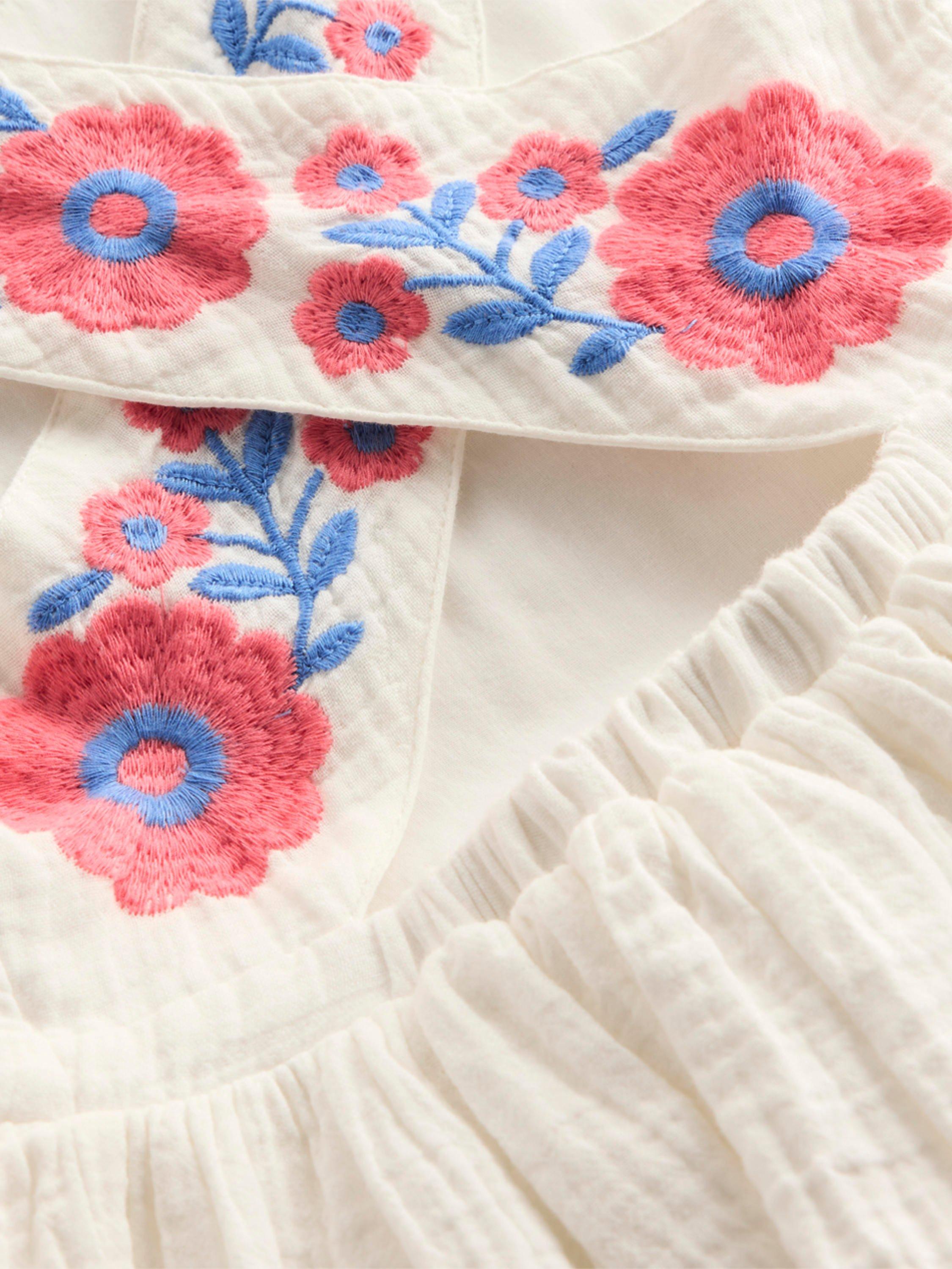 Product image 6 of 6, which shows Mini Boden Kids' Harper Cotton Sleeveless Floral Dress, White Embroidered, 2-3 years