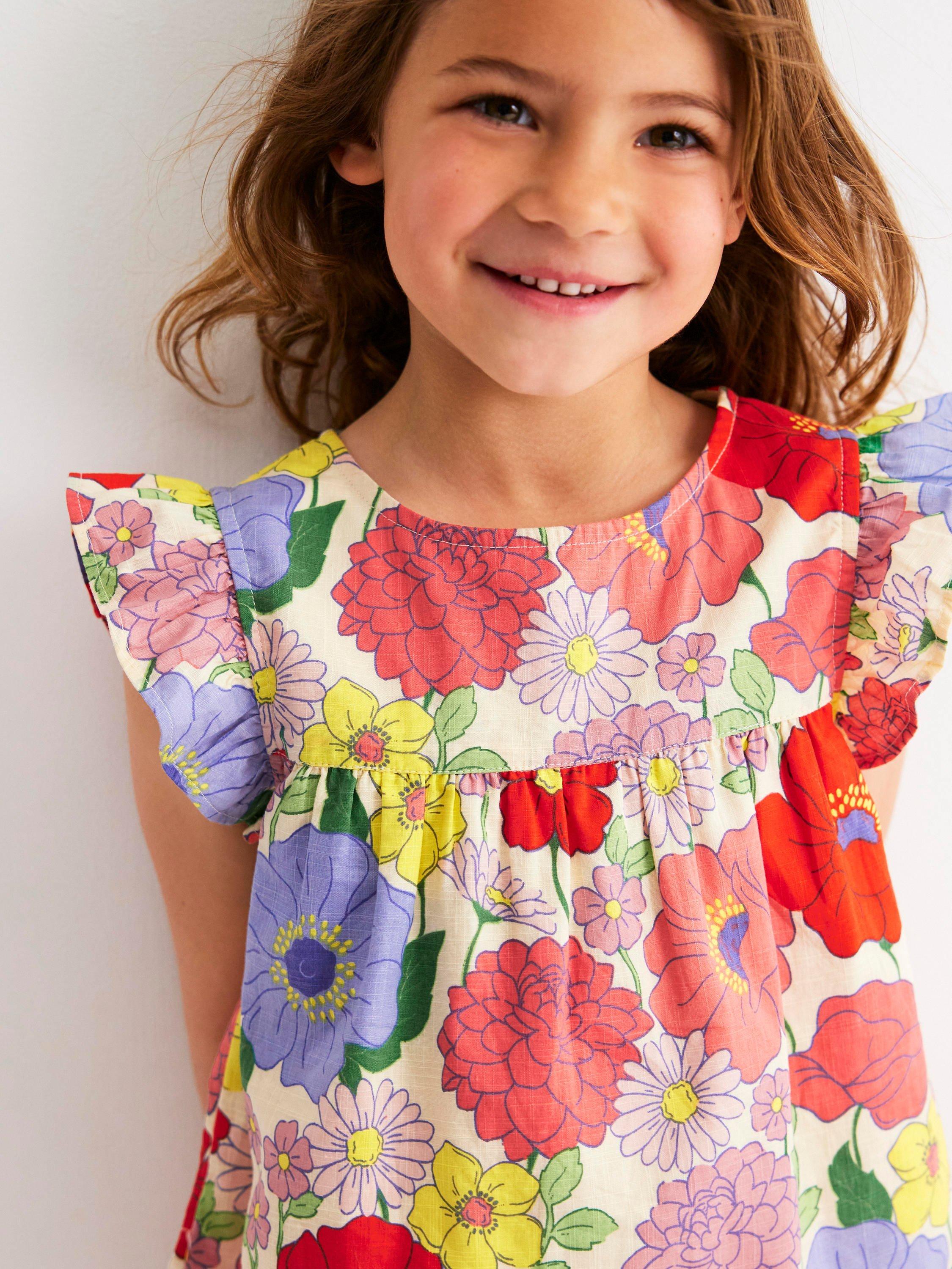 Product image 2 of 6, which shows Mini Boden Kids' Juniper Cotton Frill Sleeved Top, Multi Summer Garden, 3-4 years