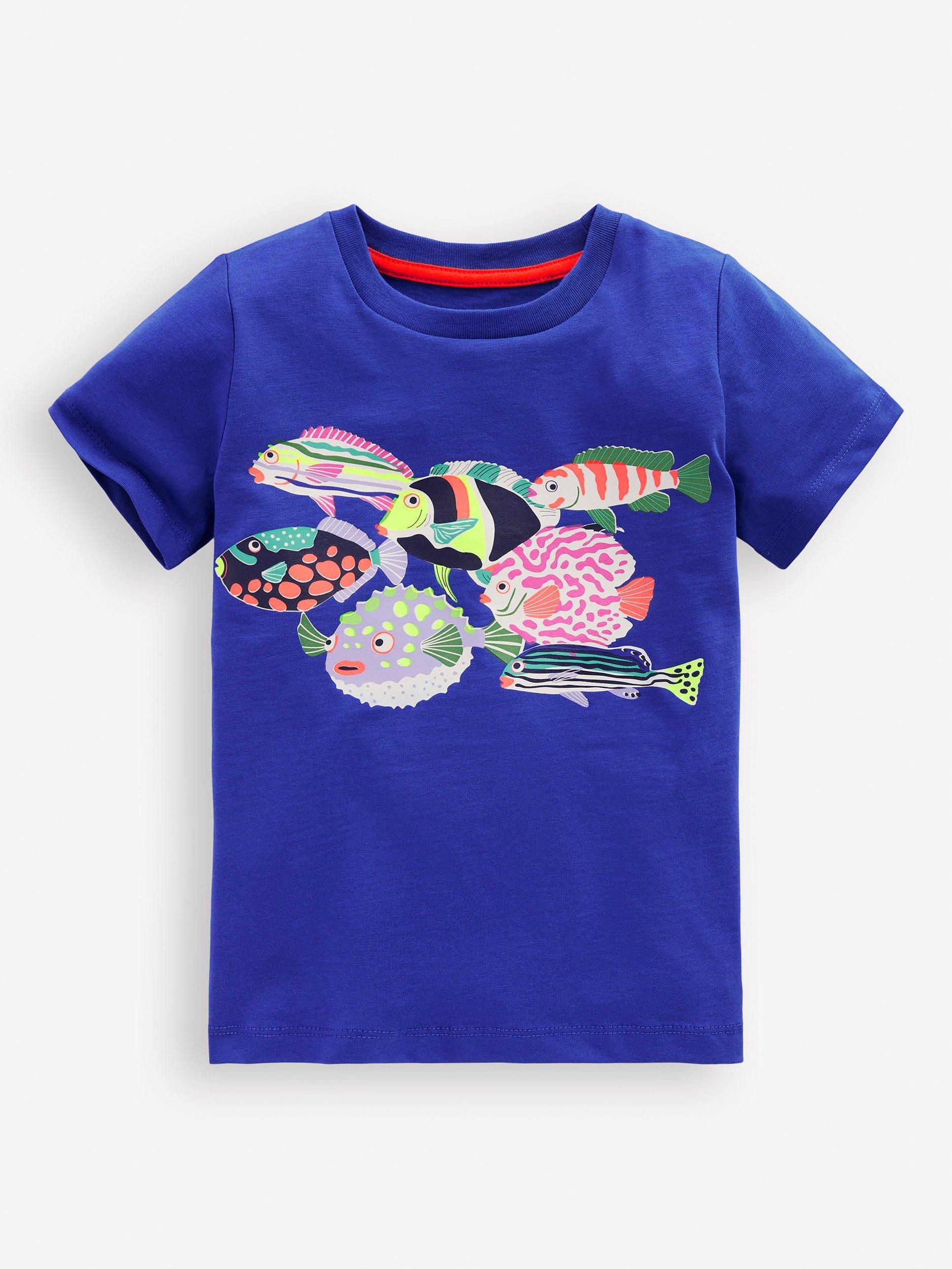 Product image 3 of 5, which shows Mini Boden Kids' Cotton Riso Relaxed Printed T-Shirt, Blue Heron Fish, 7-8 years