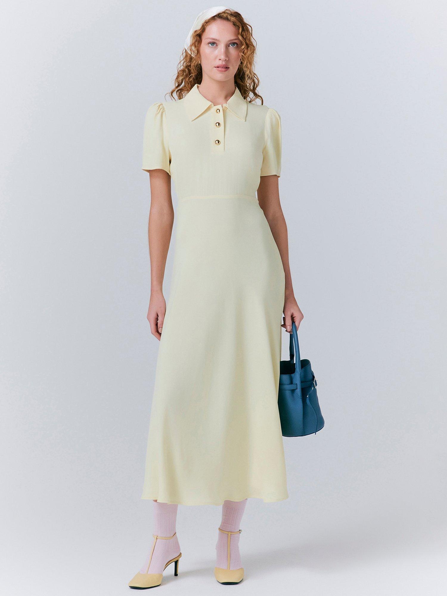 Product image 1 of 5, which shows Ghost Verity Puffed Sleeve Collared Button Detail Fitted Midi Dress, Yellow, S