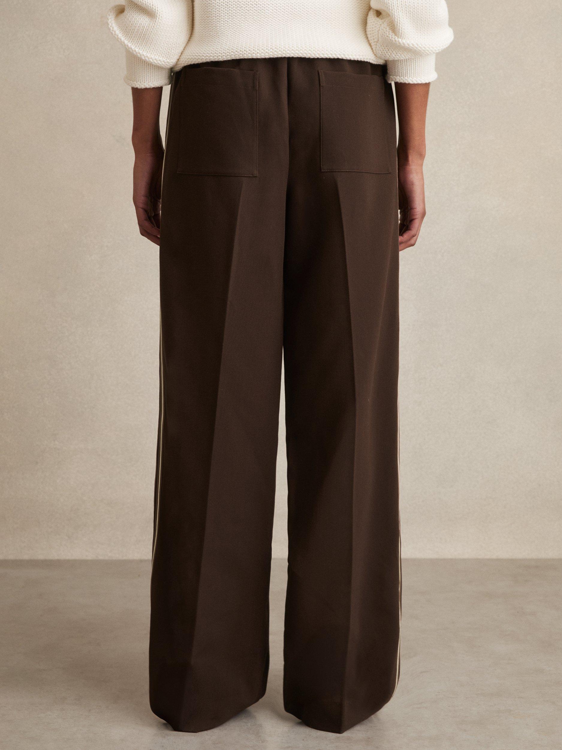 Product image 5 of 5, which shows Reiss Robyn Petite Side Stripe Mid Rise Mixed Blend Wide Leg Trousers, Chocolate Brown, 6Pt