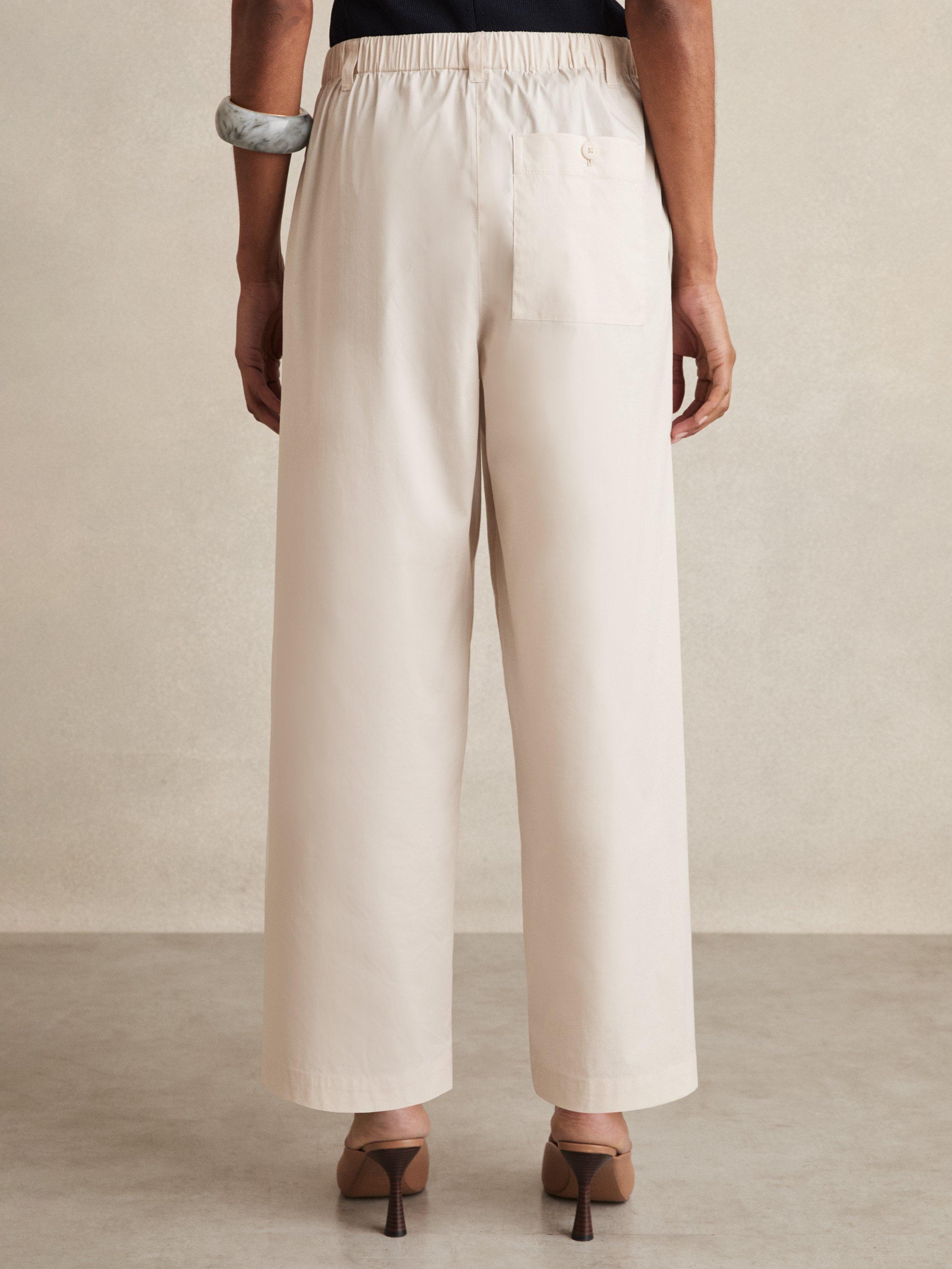 Product image 2 of 5, which shows Reiss Osbourne Cropped Cotton Blend Taper Trousers, Stone, 16