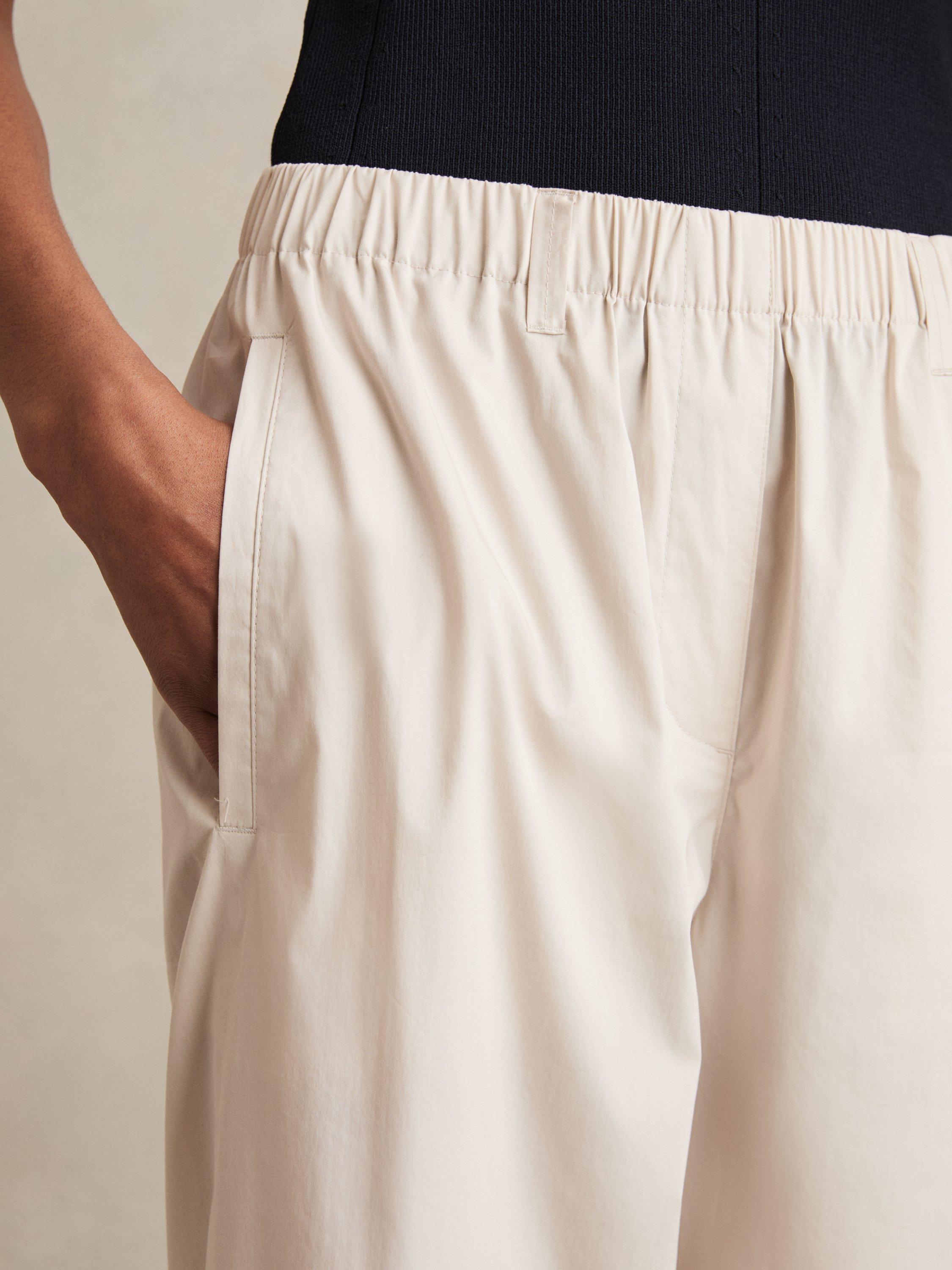 Product image 5 of 5, which shows Reiss Osbourne Cropped Cotton Blend Taper Trousers, Stone, 16