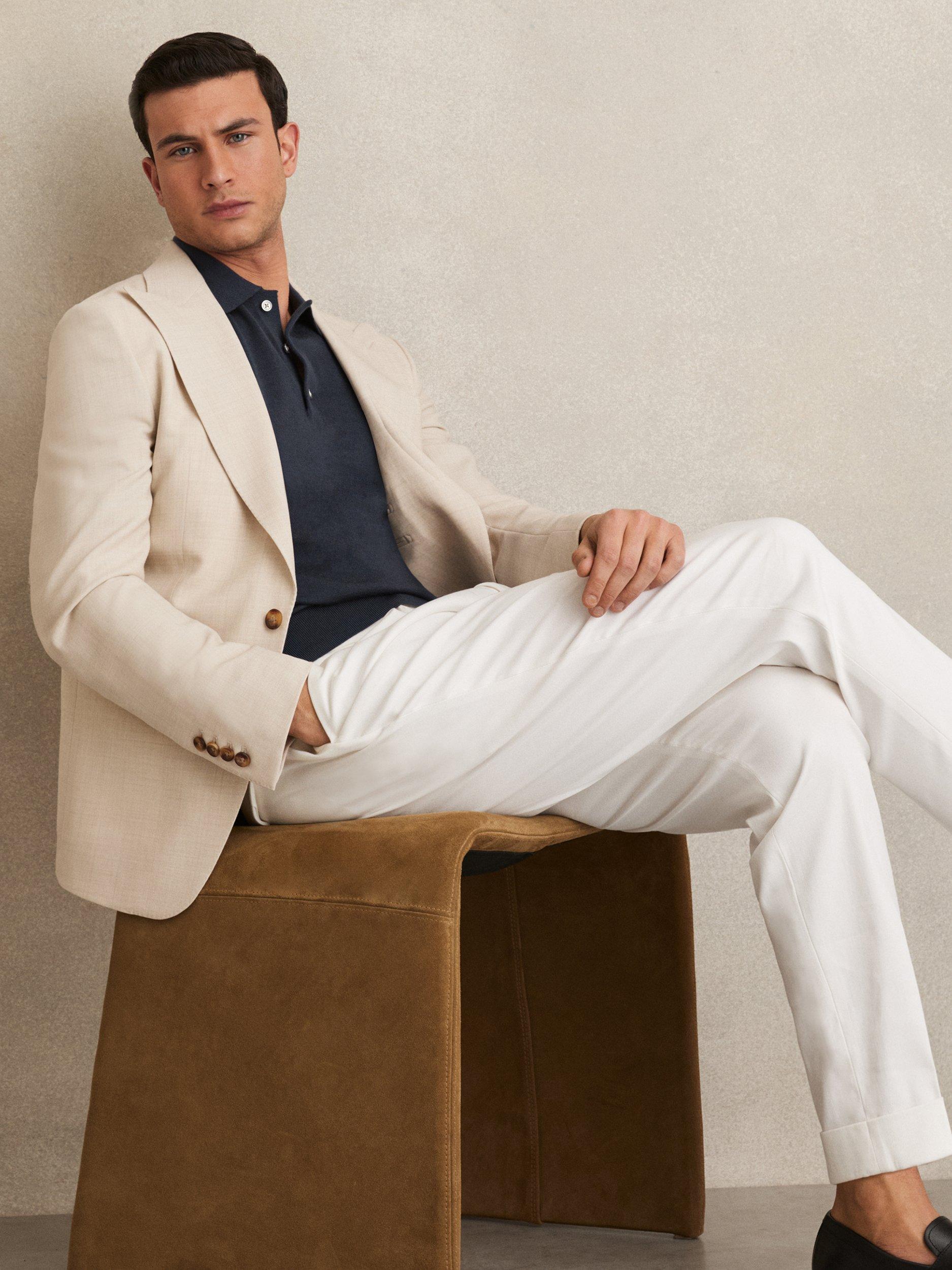Product image 2 of 5, which shows Reiss Manor Wool Short Sleeved Polo Shirt, Navy, XS