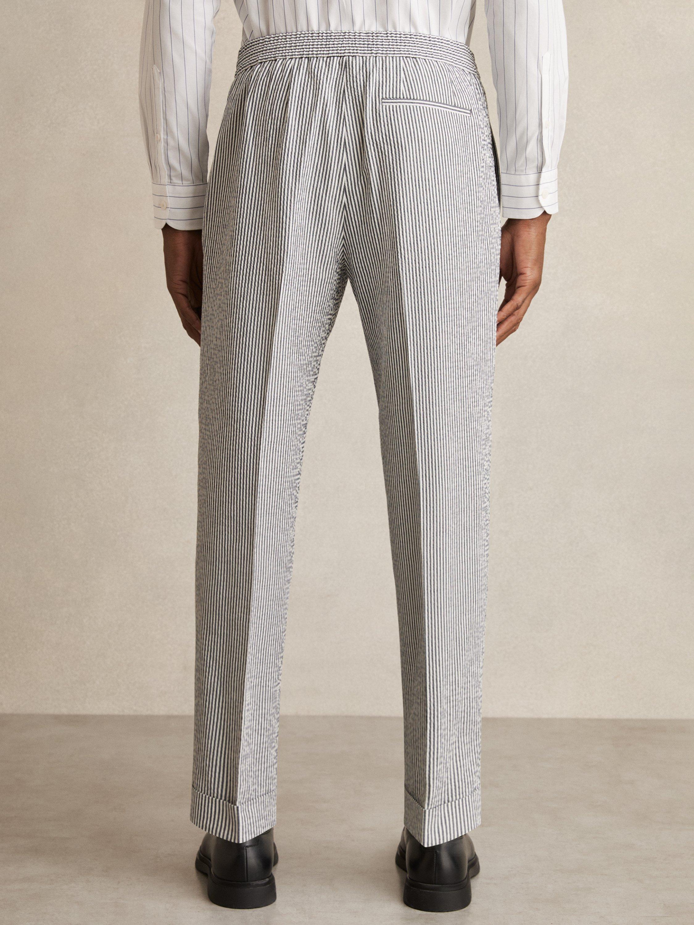 Product image 2 of 5, which shows Reiss Sail Cotton Seersucker Slim Fit Striped Trousers, Navy/Multi, 28R