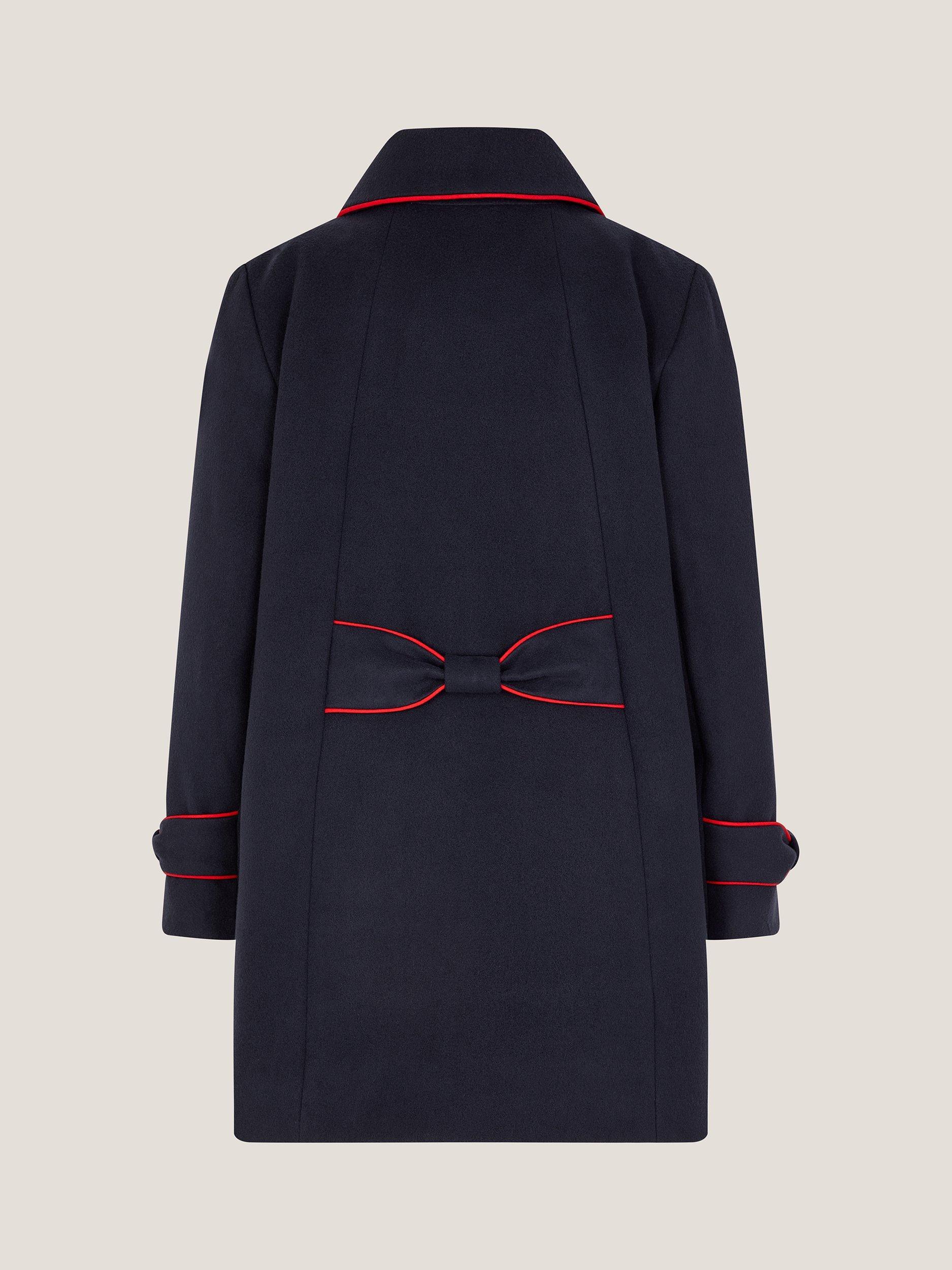 Product image 2 of 3, which shows Monsoon Kids' Contrast Piped Bow Coat, Navy, 3-4 years
