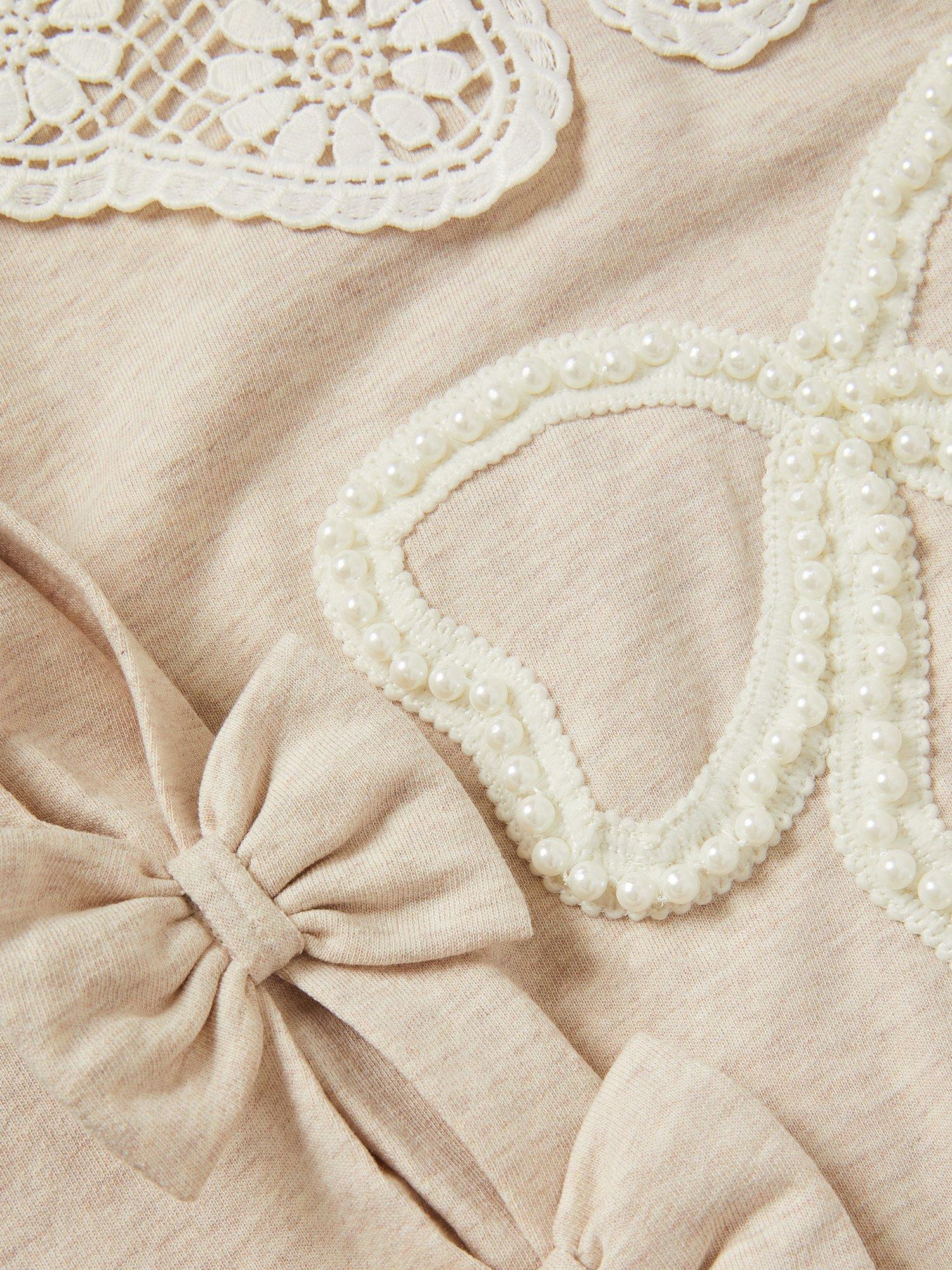 Product image 3 of 3, which shows Monsoon Kids' Cotton Lace Collar Bow Sweatshirt, Ivory, 3-4 years