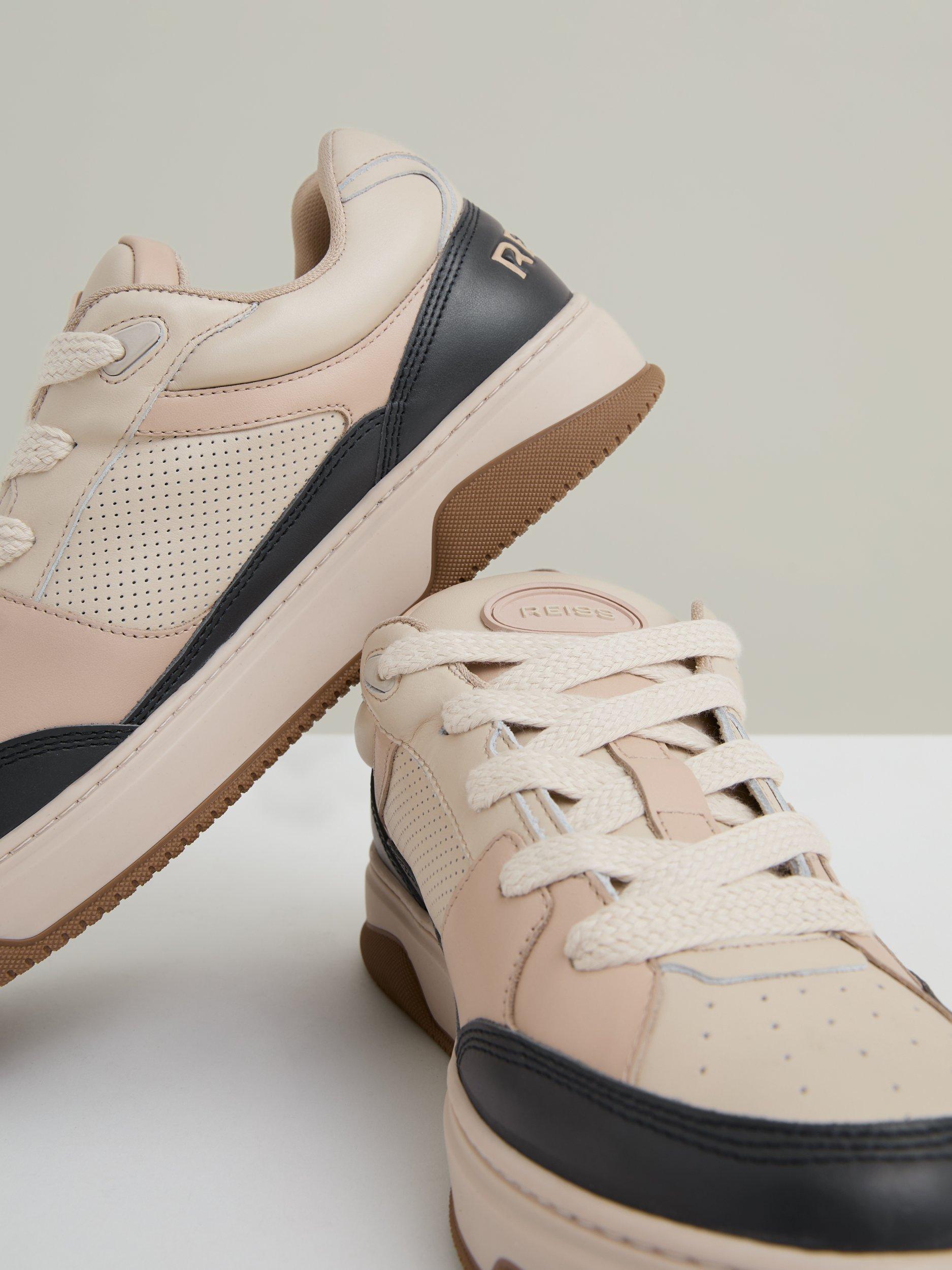 Product image 2 of 5, which shows Reiss Alvar Panelled Leather Lace Up Trainers, Ecru/Charcoal, 7