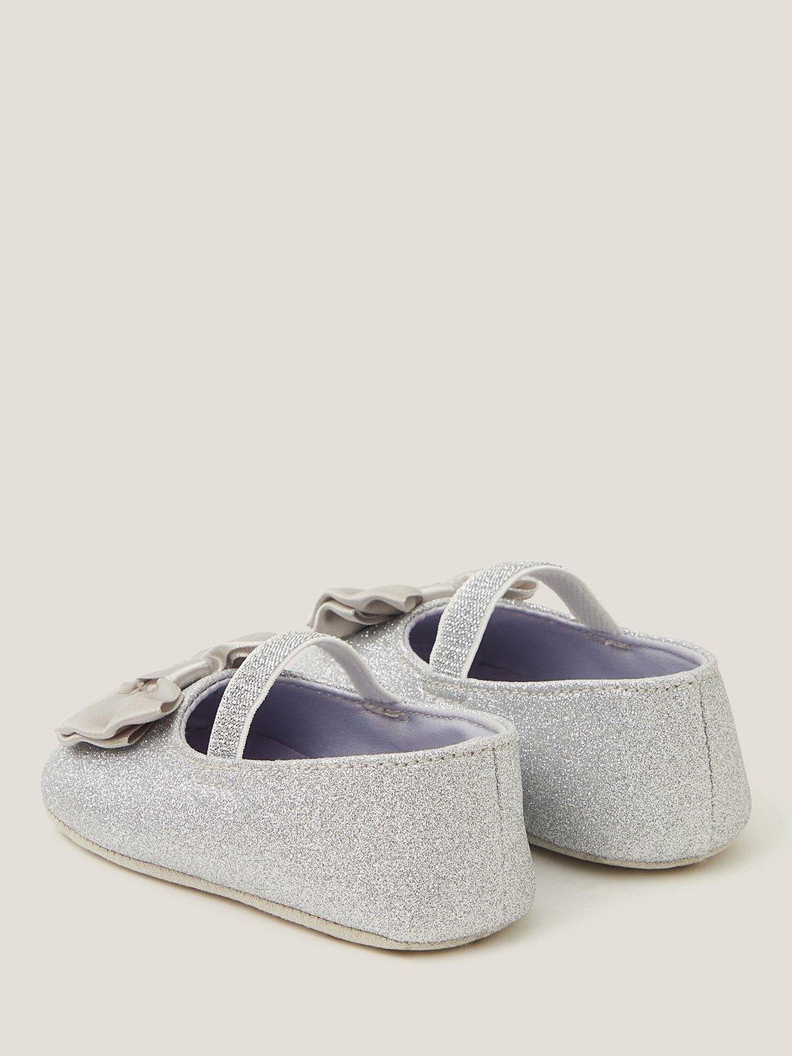 Product image 2 of 3, which shows Monsoon Baby Glitter Bow Bootie and Headband Set, Silver, 0-3 months