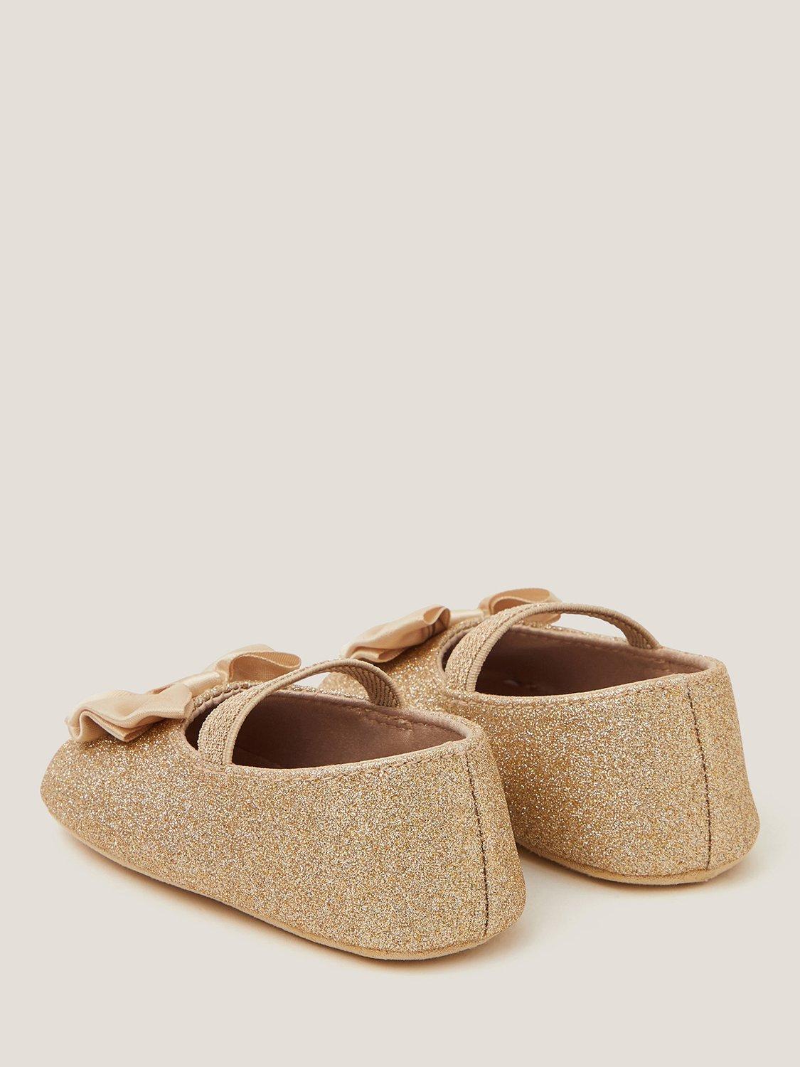 Product image 2 of 3, which shows Monsoon Baby Glitter Bow Bootie and Headband Set, Gold, 6-12 months