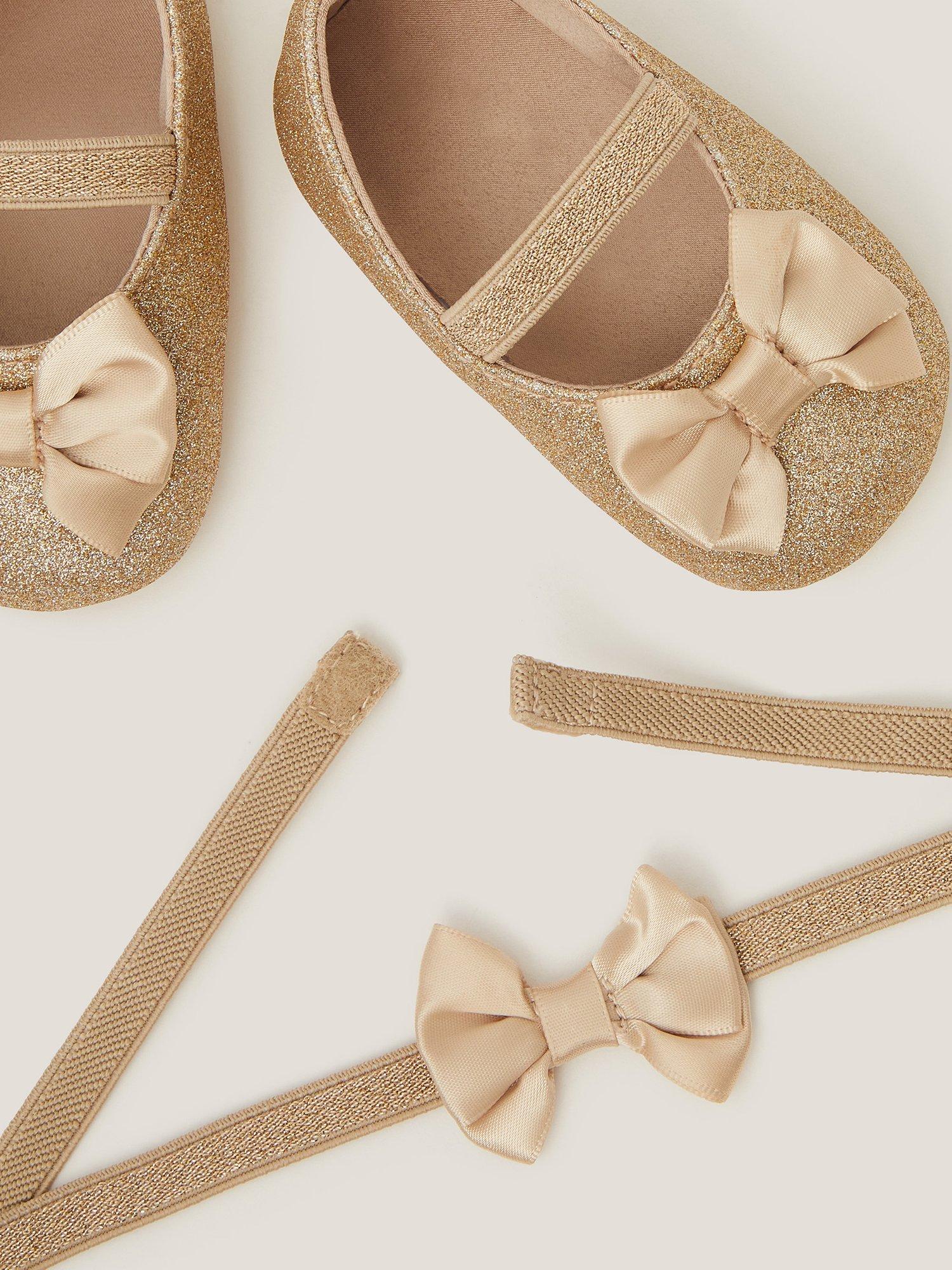 Product image 3 of 3, which shows Monsoon Baby Glitter Bow Bootie and Headband Set, Gold, 6-12 months