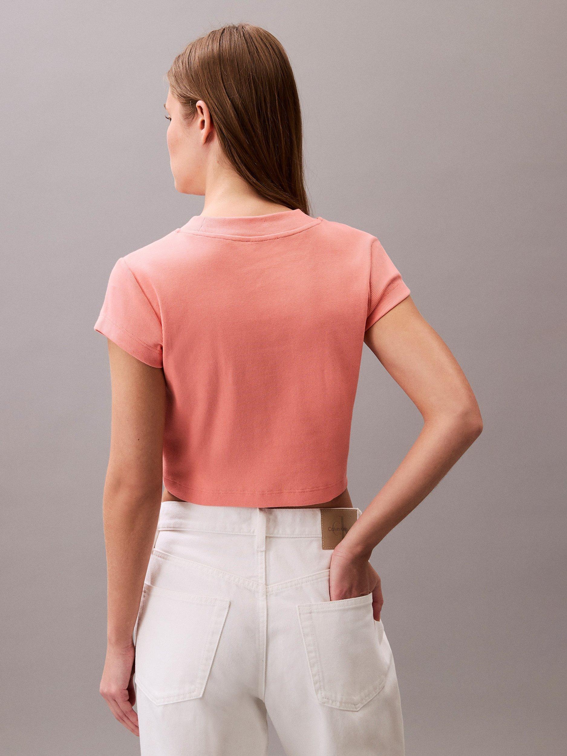 Product image 2 of 5, which shows Calvin Klein Monogram T-Shirt, Powder Orange, XXS